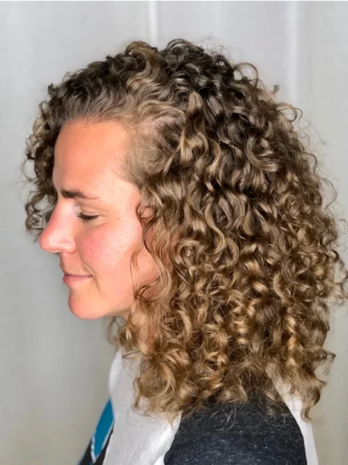 curly hair left profile.webp