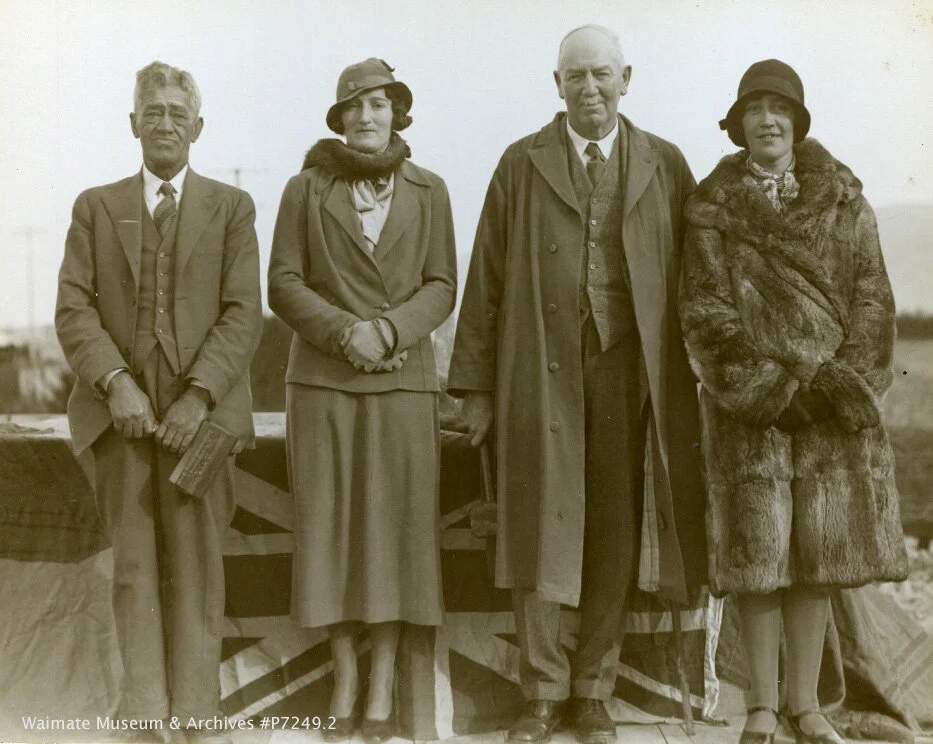 Ceremony of laying of foundation stone of the 80th anniversary memorial of first white settler in Waimate at the corner of Gorge Road and Queen Street.L-R. J Huruhuru, Miss Studholme, E C Studholme, Miss Huruhuru. J Huruhuru was the grandson of Chie…
