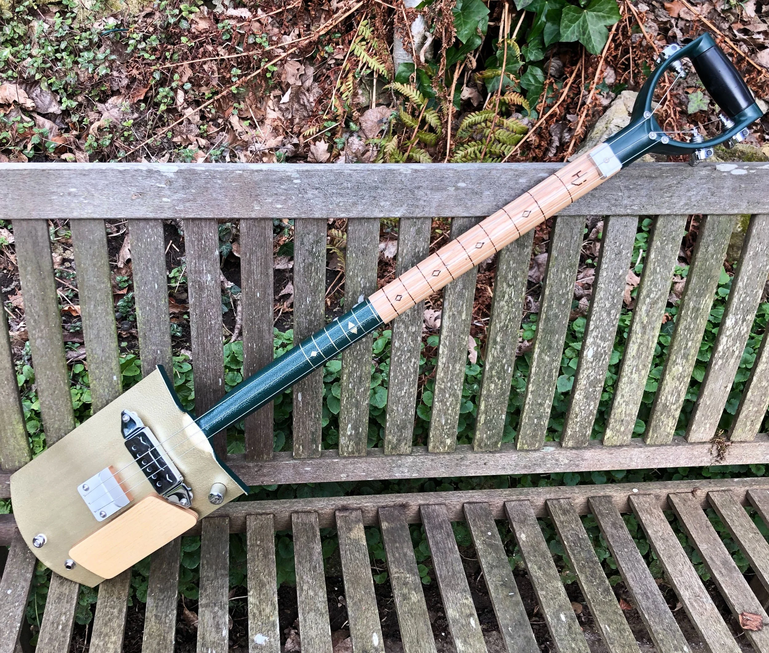 Gold Back Electric 3-String Shovel Guitar - 25 1/2" Scale Length, Non-Cutaway