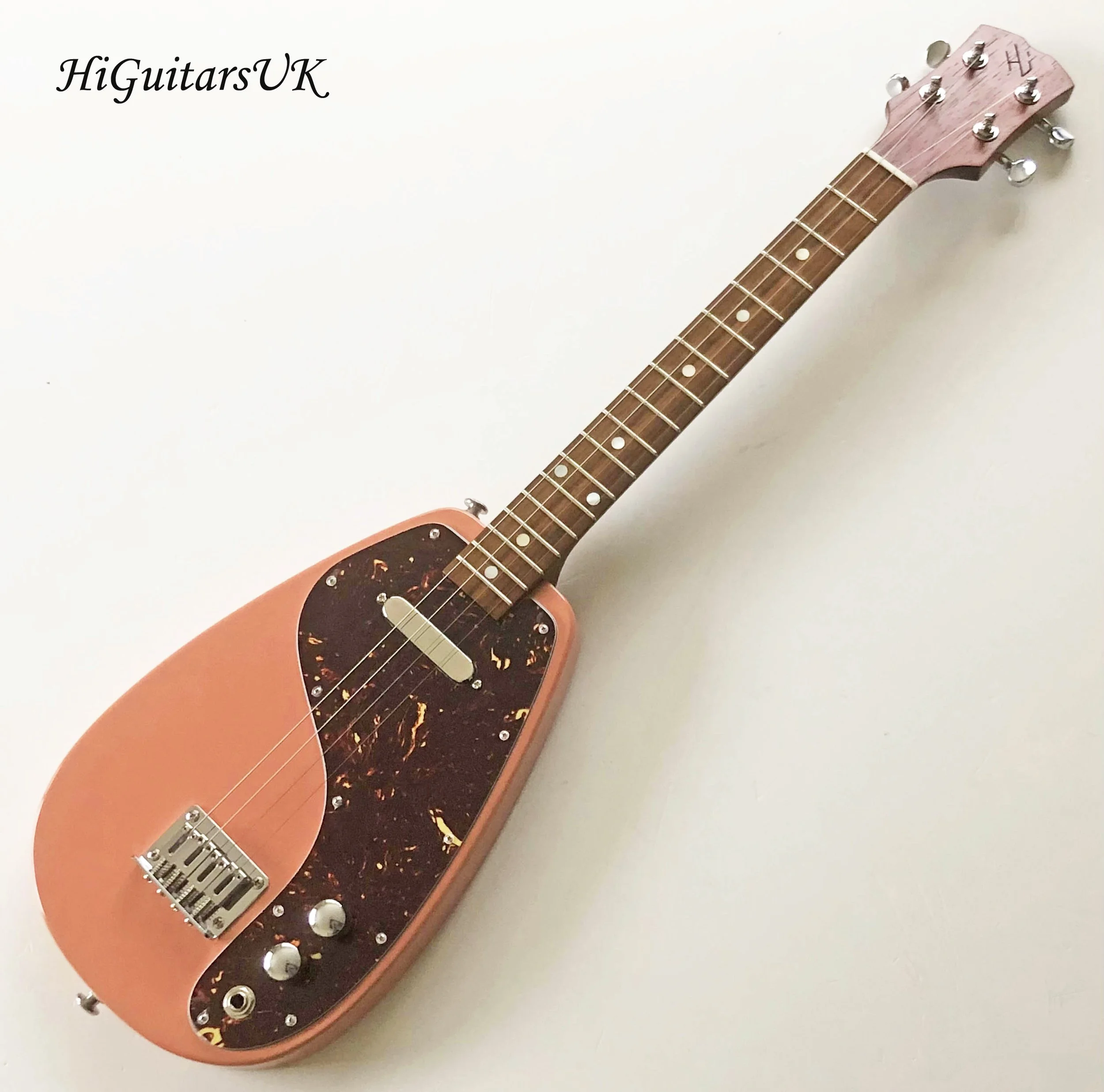 Raindrop 20" Scale Solid Body Electric Baritone Ukulele. Dirty Apricot. Minor cosmetic flaws.