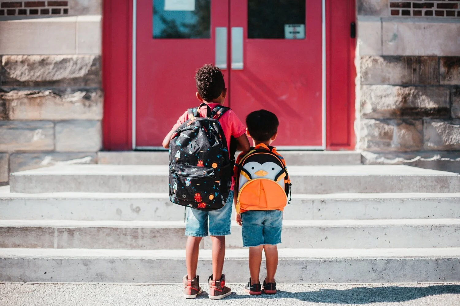 Adding an At-Risk Preference in School Lottery