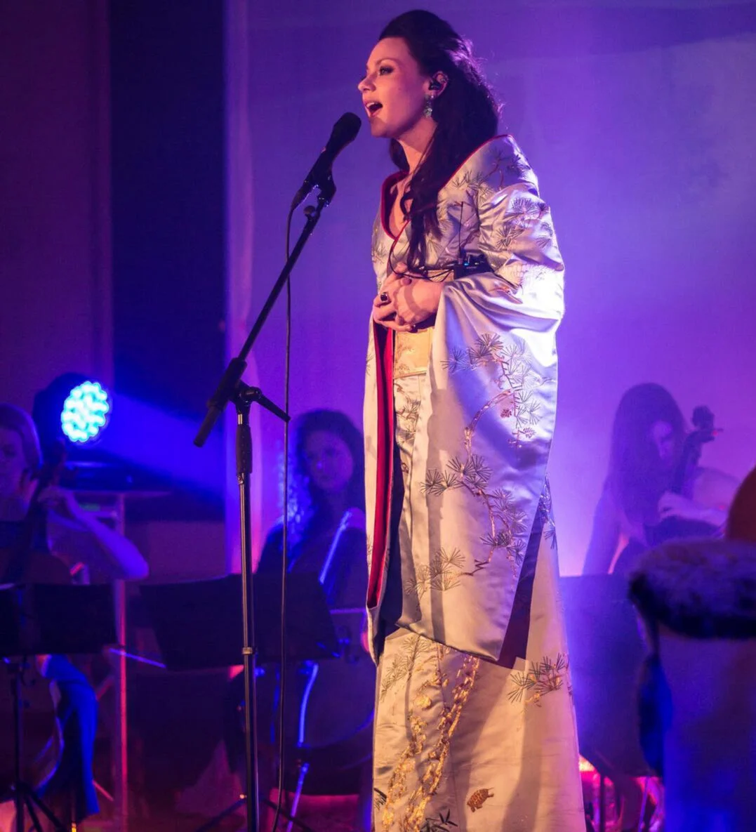 January Thompson performing at her CauseLight Benefit Concert in London.