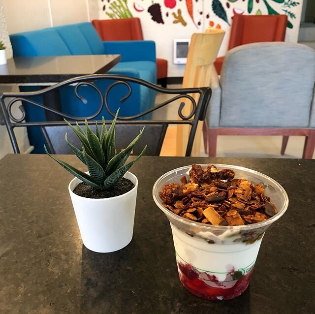 Greek yogurt parfait with fresh strawberry&rsquo;s and delicious granola made by Salmonberry Goods!