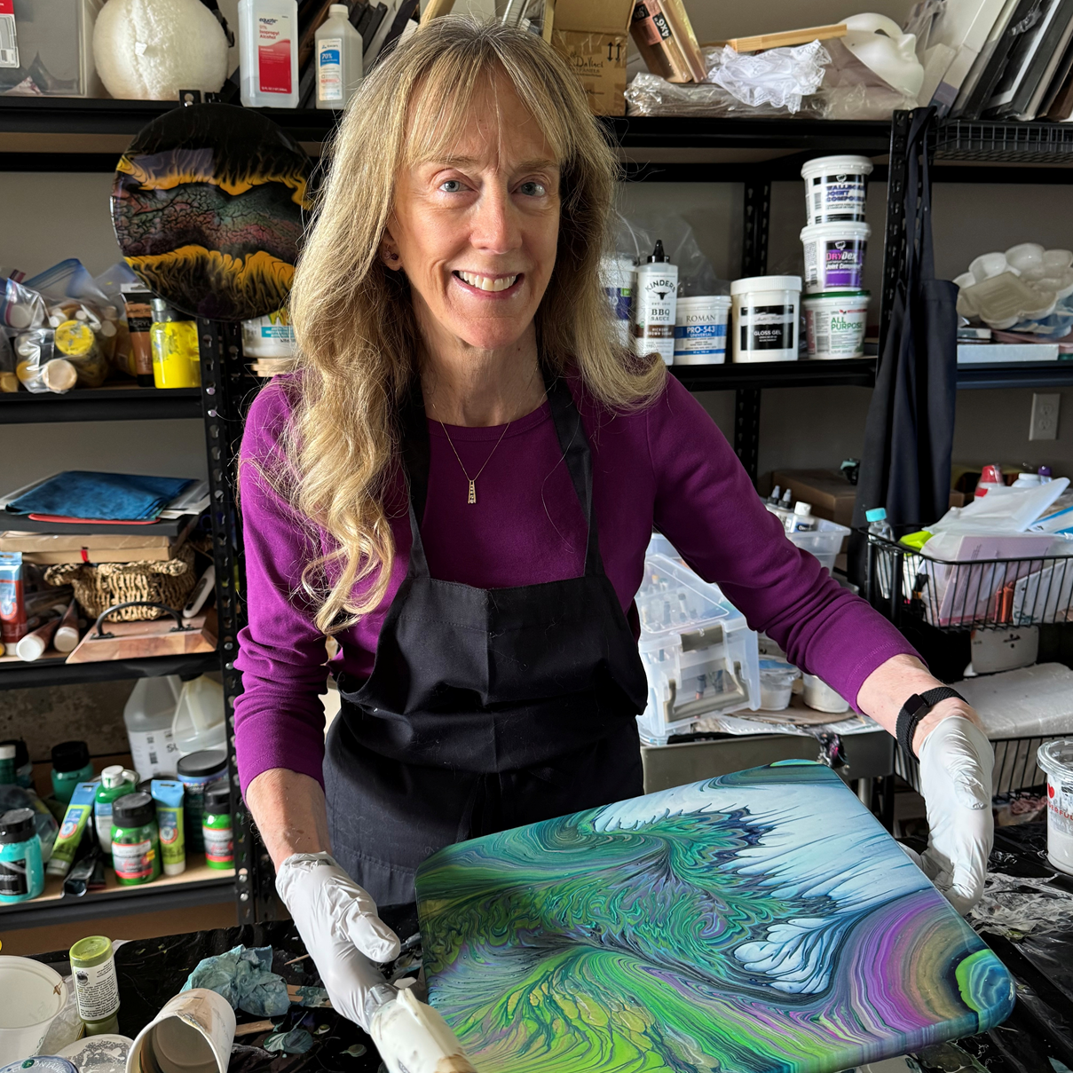 Chelain Stocker artist in studio.png