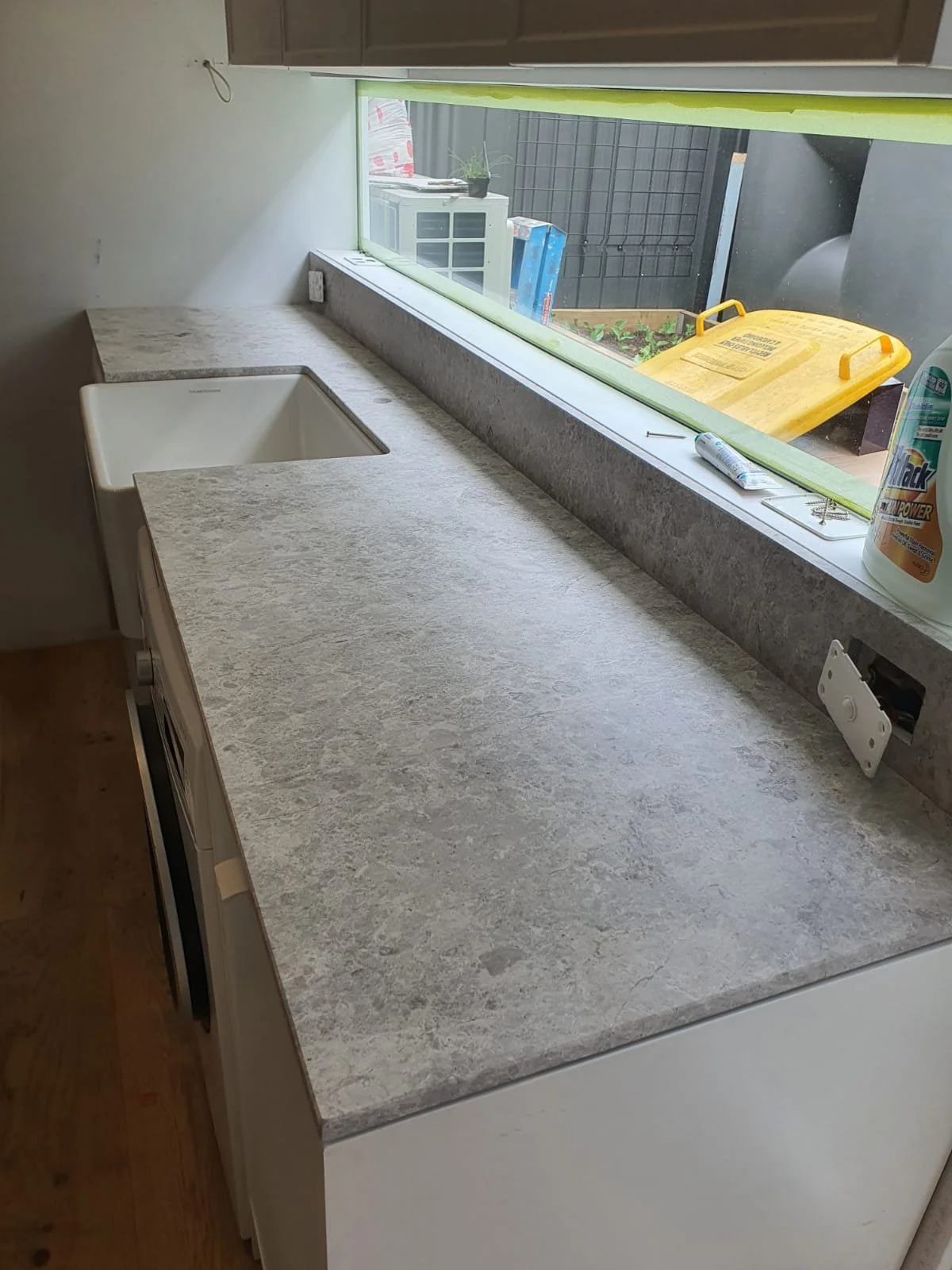 Rock Emporium Kitchen completed in Light grey Tundra honed