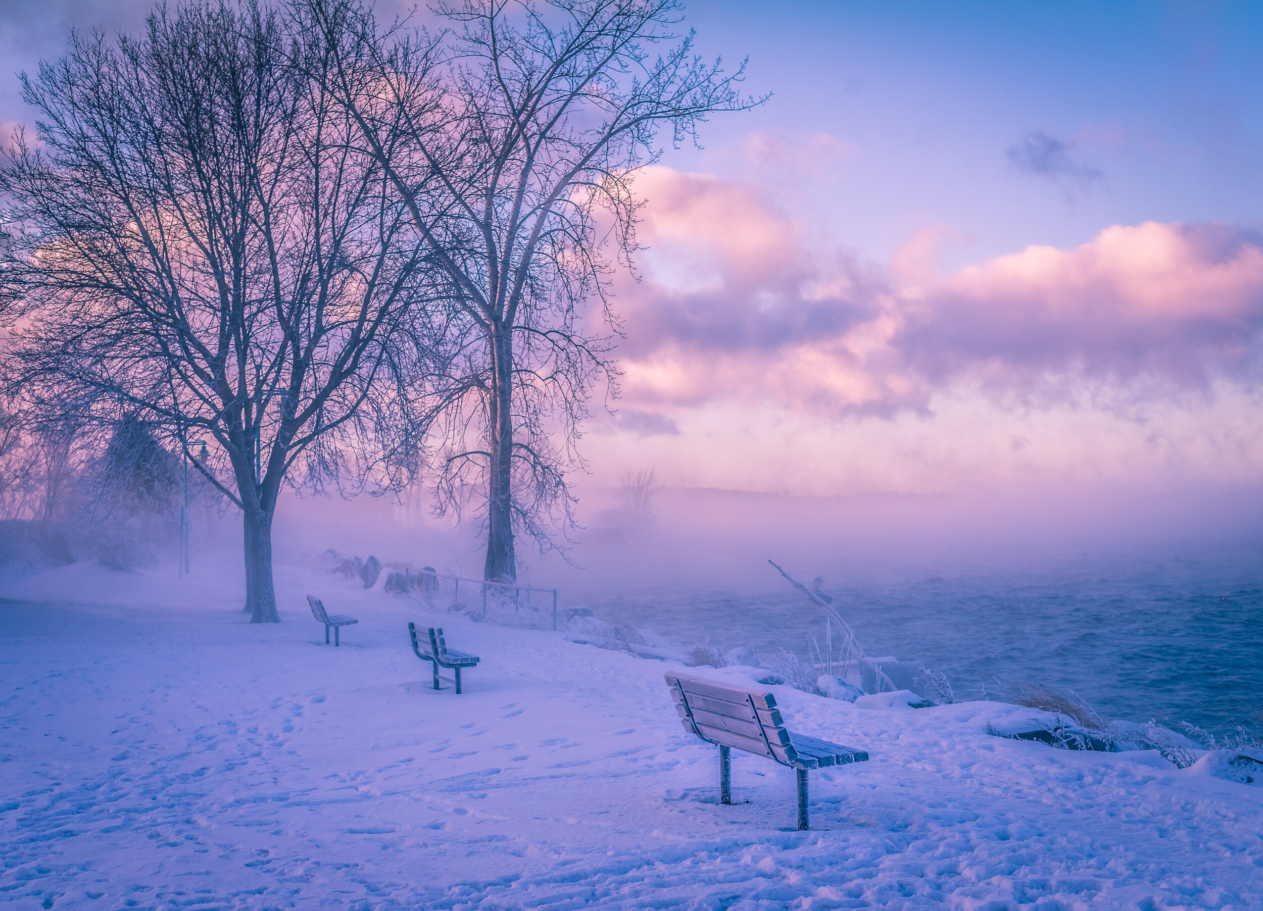 A cold and foggy sunrise on the shores of Lake Champlain