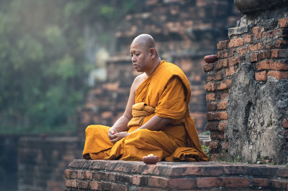 Canva---Buddhist-Monk-Meditating.jpg