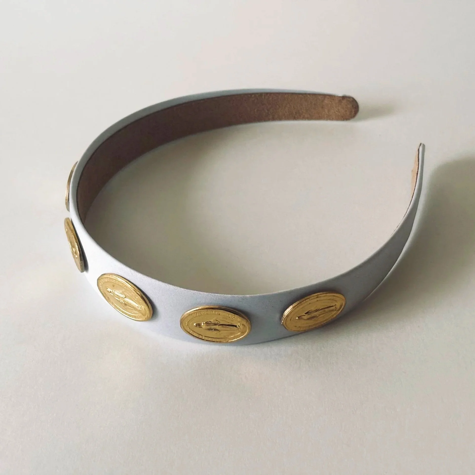 OUR LADY MIRACULOUS MEDAL HEADBAND WITH SIX GOLD MEDALS ON WHITE SATIN