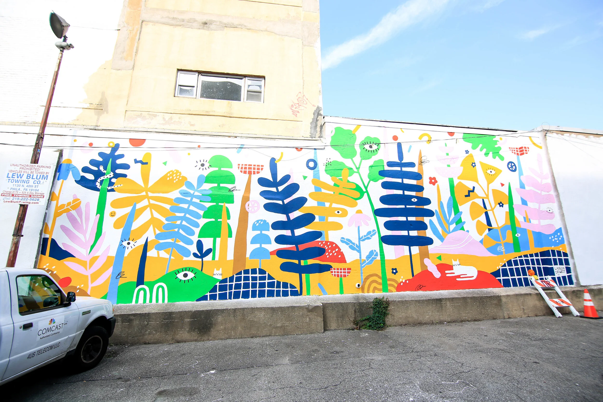 "Urban Explorations" mural by Lauren Cat West