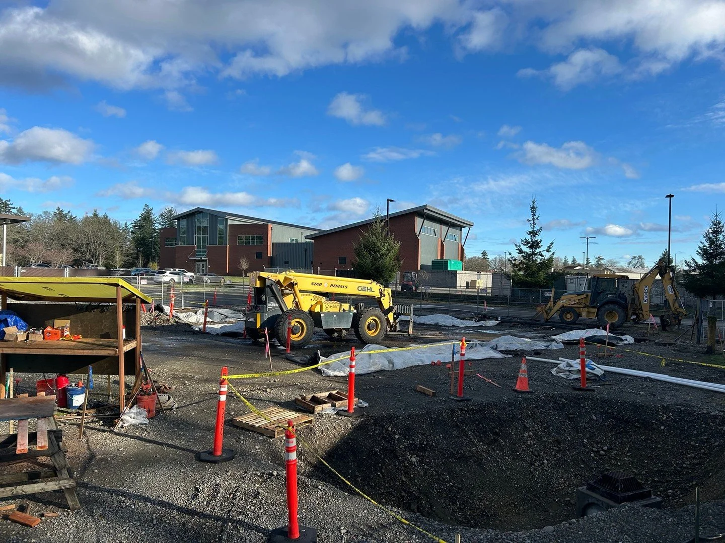 Easy as 1, 2, 3, 4, 5 ... right? 

Not quite. This job came with quite a few unforeseen conditions as we began site development. Our team uncovered remnants of a former vehicle washout station&mdash;unknown utilities, a buried vault with a pump, a ca