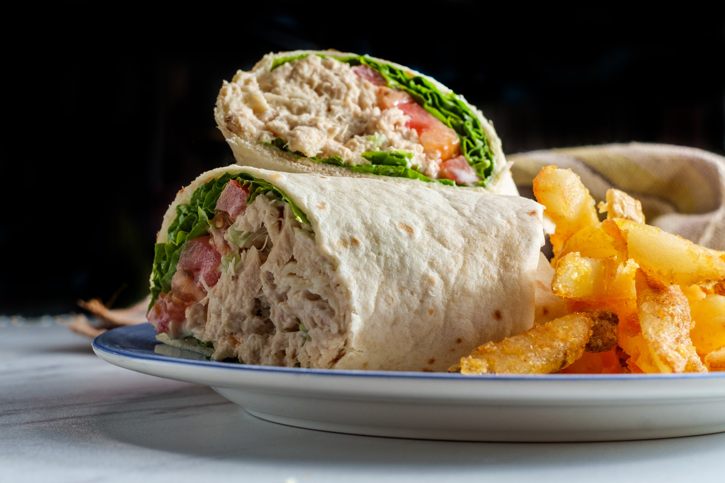 bigstock-Tuna-Salad-Wrap-Sandwich-With--321843967.jpg