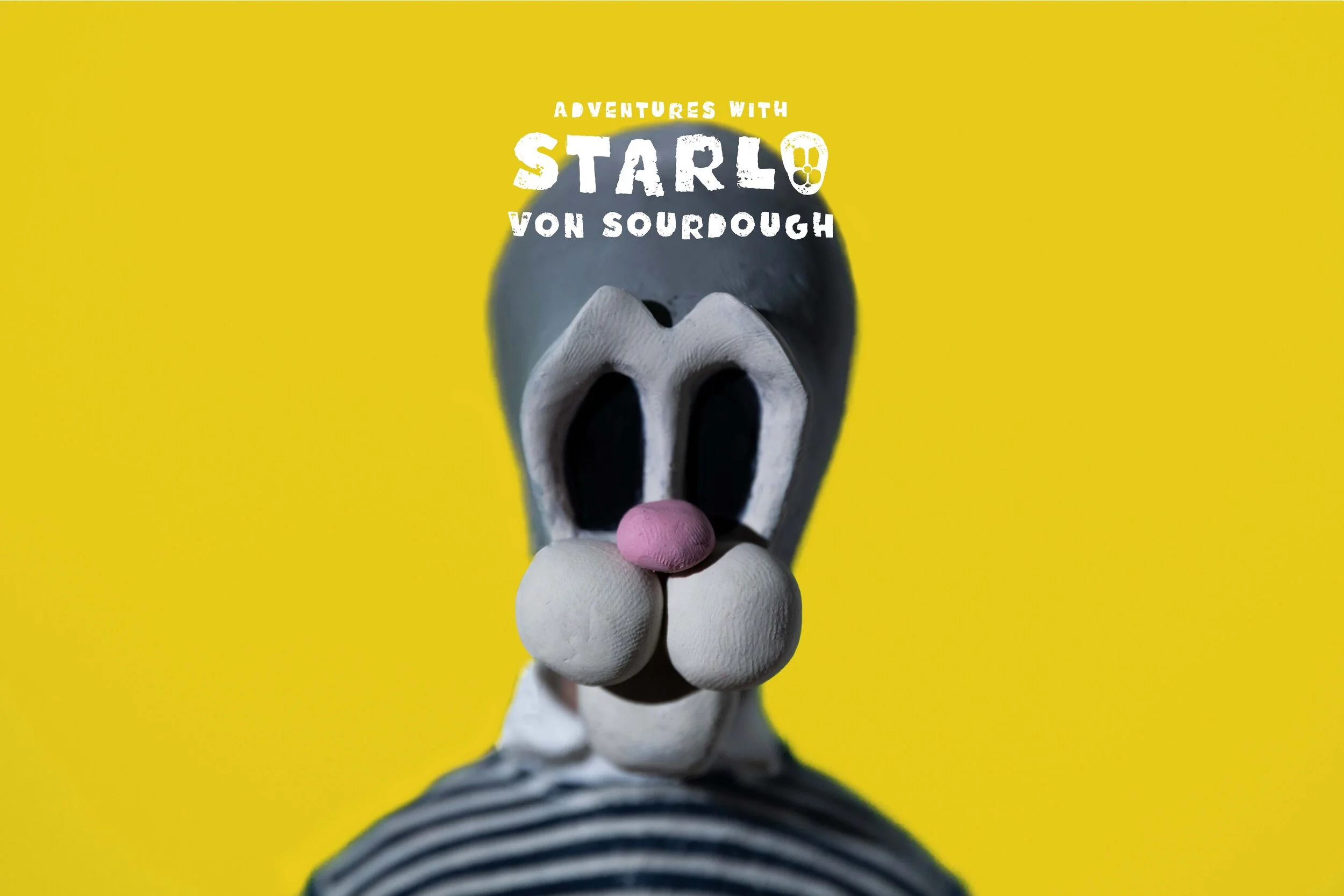 starlo closeup yellow background middle-squashedwith adventure logo.jpg