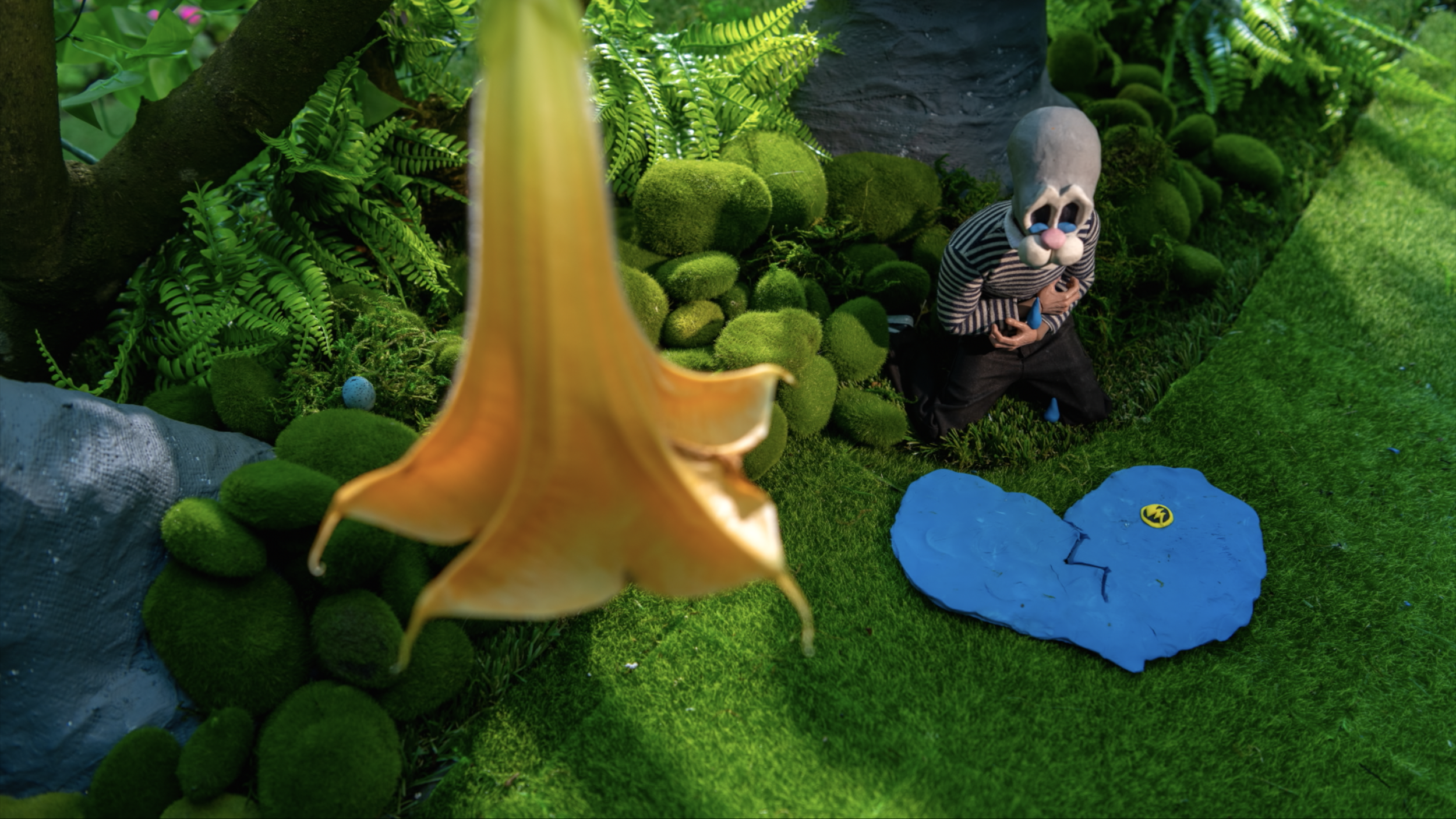 starlo crying while trumpet tree blossoms -squashed.png