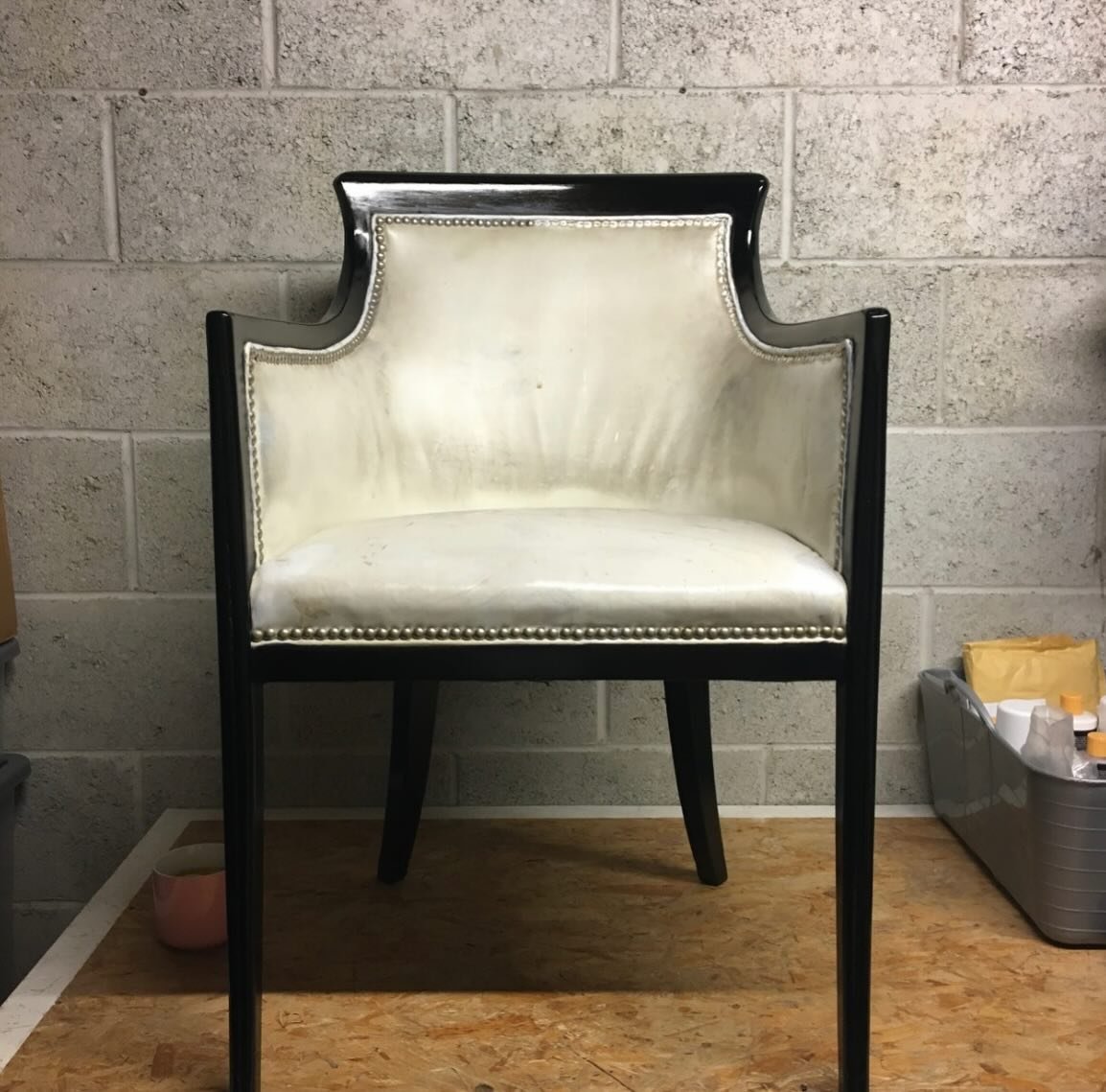 A set of 6 white leather tub chairs from the retired QE2. All six were deep cleaned using professional leather cleaning solutions and techniques. The leather was then stabilised and consolidated and had any cracks filled and or treated and then leath