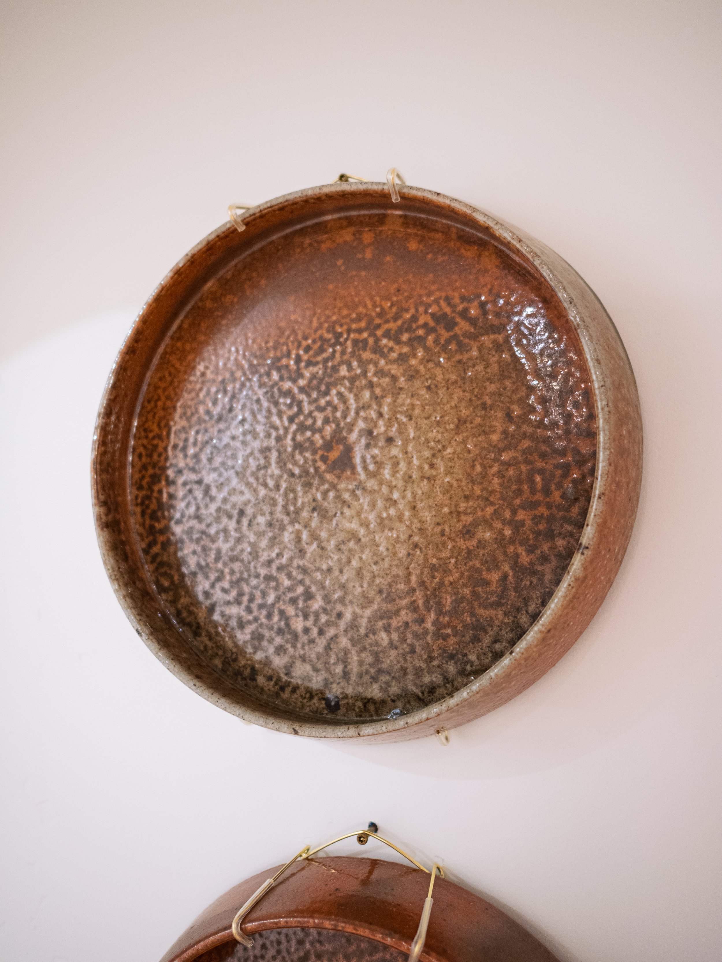 Olivia Berkey Sharing plate wild clay slip wood:soda fired 2025.jpg