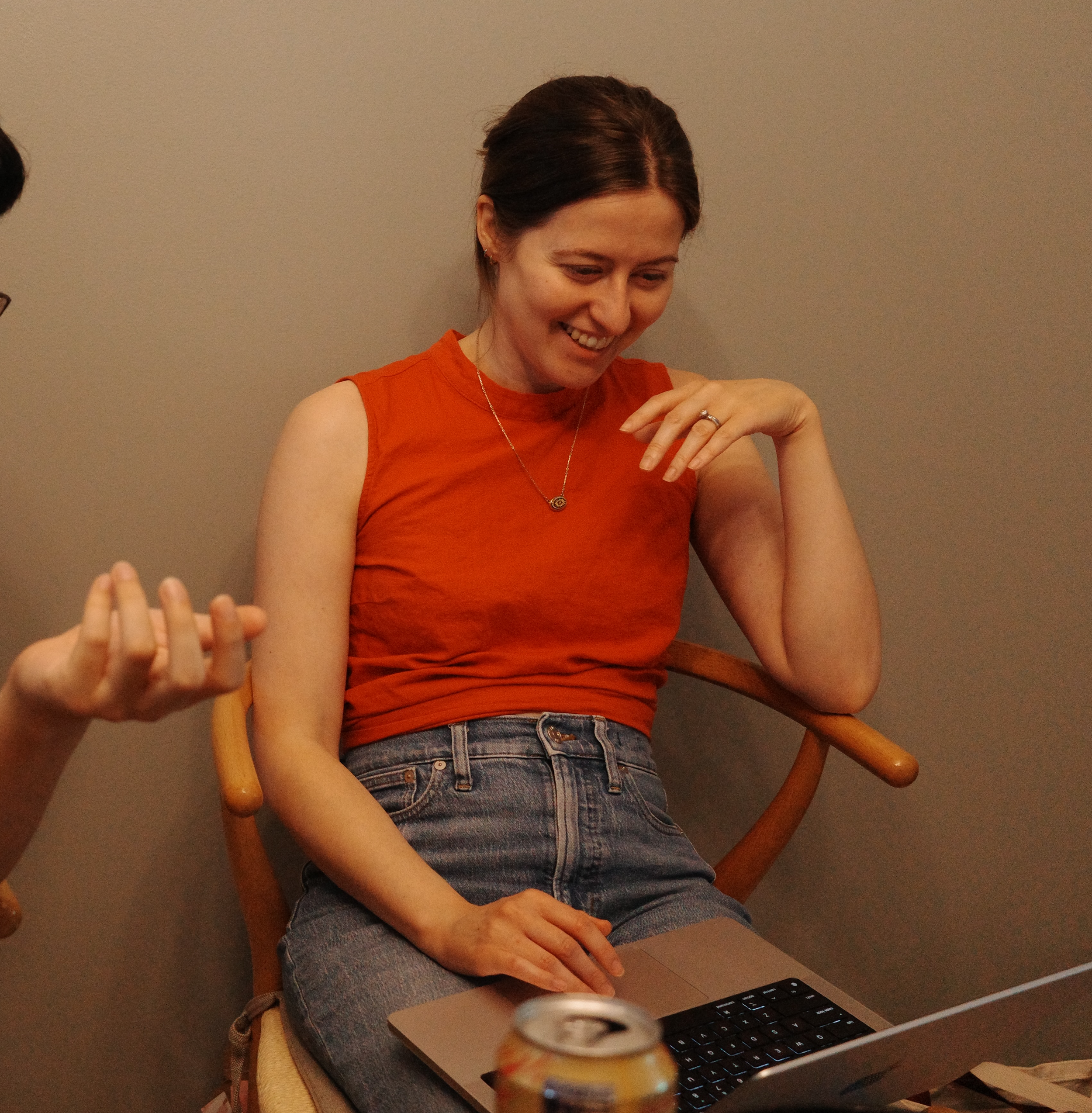 Rachel Lee smiling while working with a client