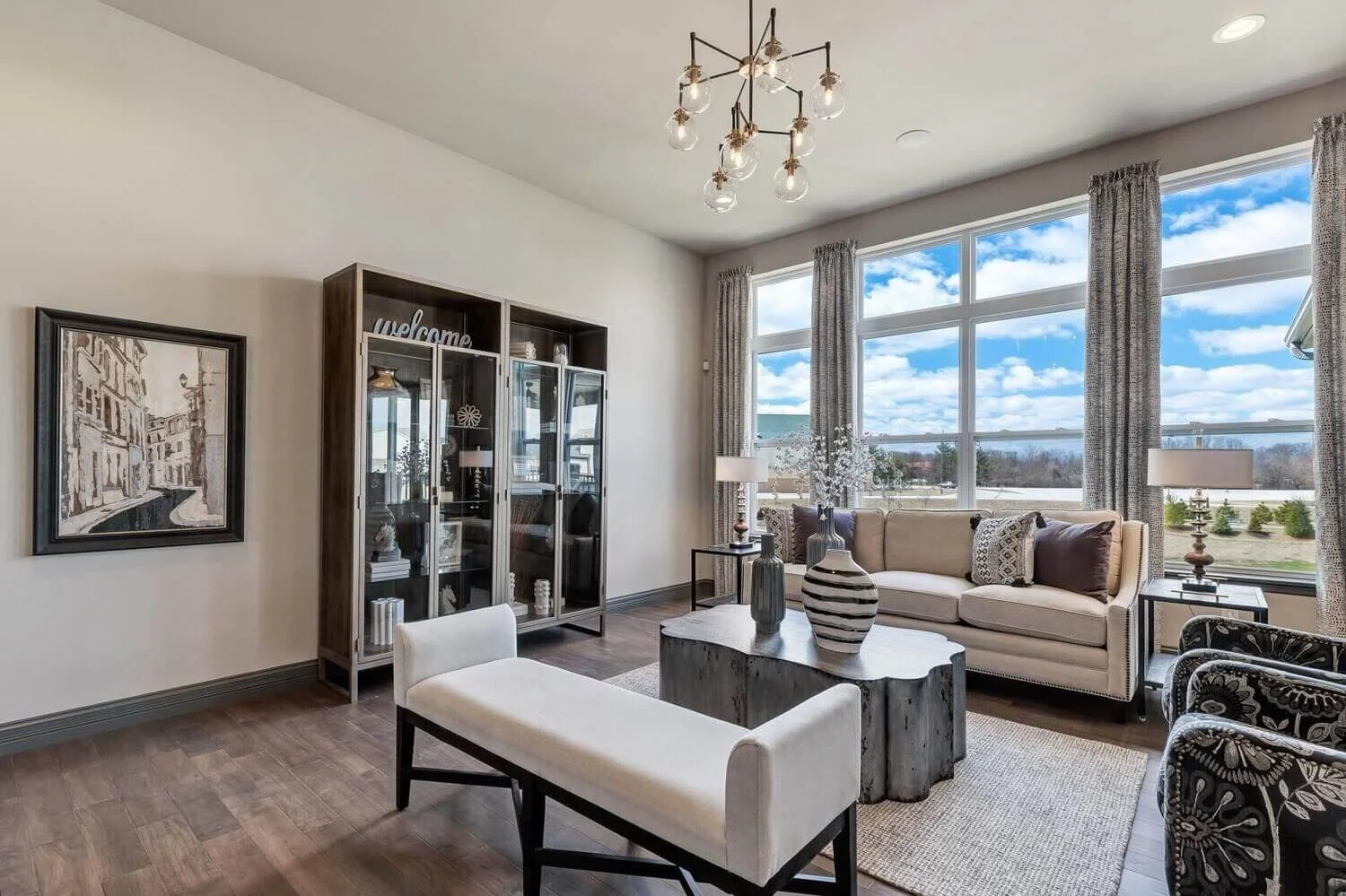 Living Room with Tall Windows and Bookcase.jpeg
