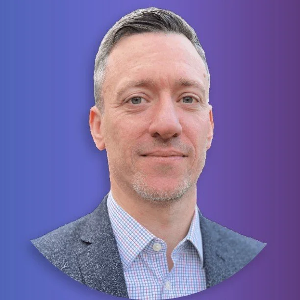 Portrait of a man with a blue-to-purple gradient background