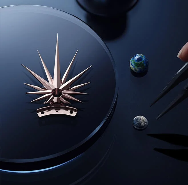 A wristwatch shaped like a star or compass, along with miniature Earth and moon models, and precision tools on a dark surface.