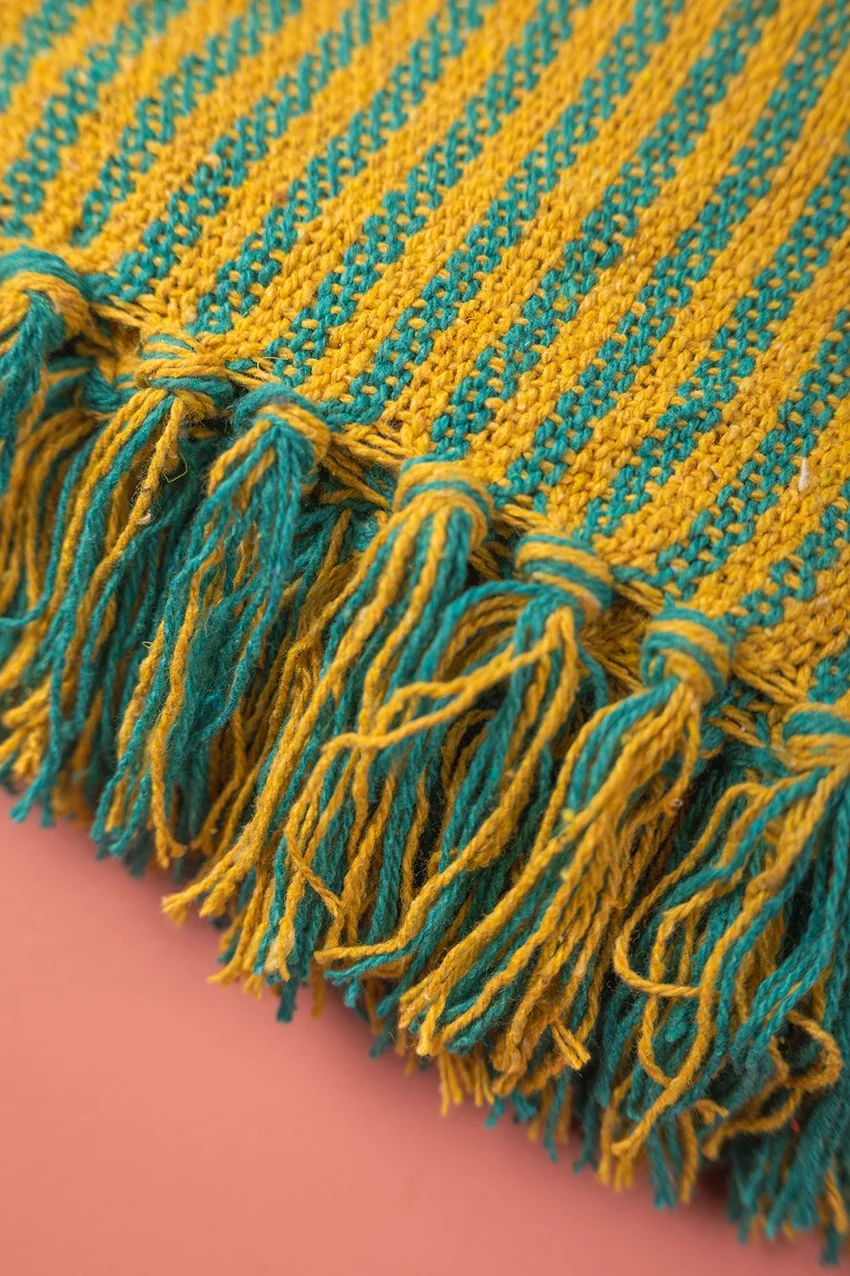 Yellow green throw tassels.webp