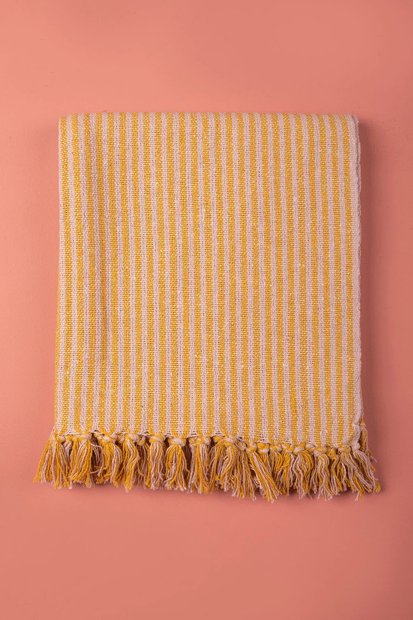pink mustard throw folded.webp