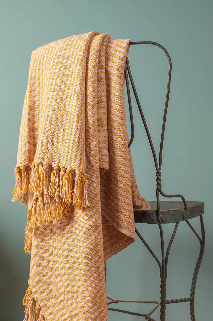 pink mustand throw.webp