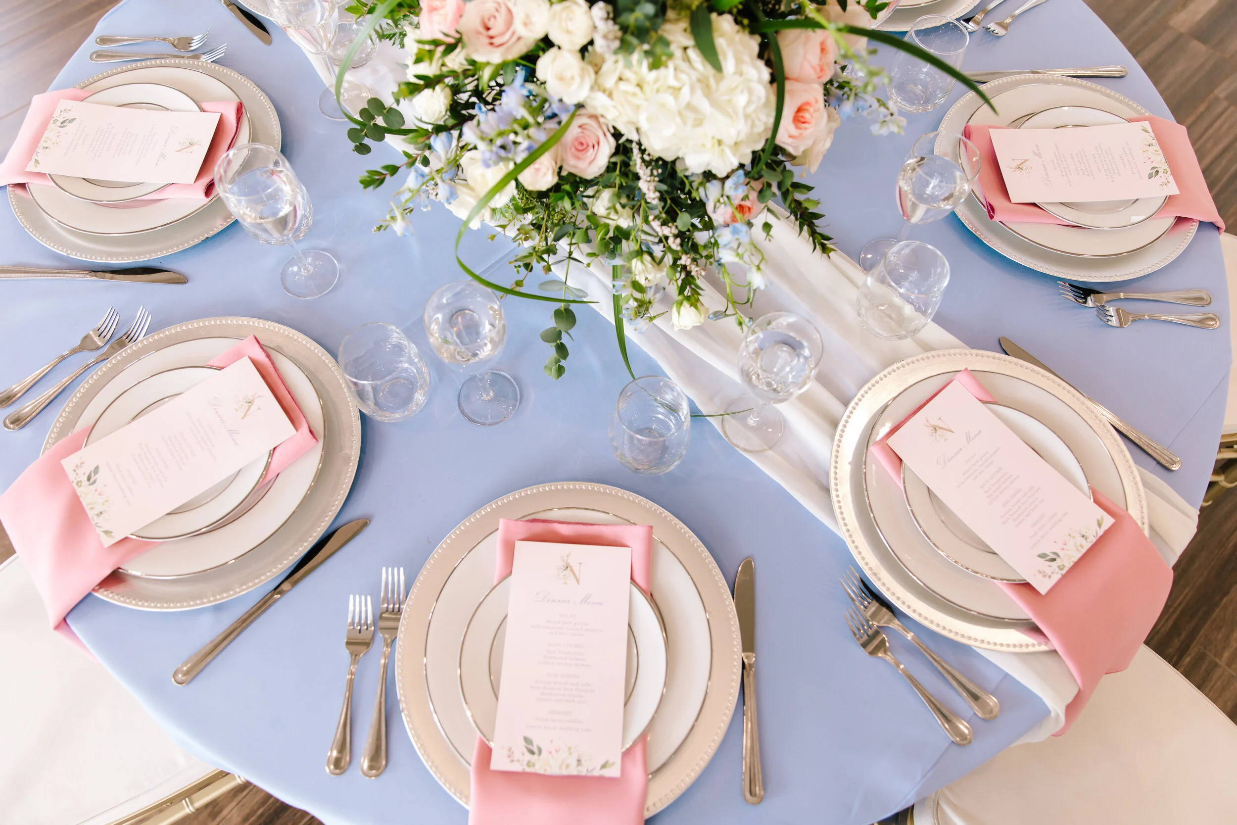  meaningful ways to elevate your wedding day decor and venue table setting inspiration beautiful bright blue and pink table setting wedding wedding flower placement ideas floral table setting inspiration for the modern bride beautiful bridal flower t
