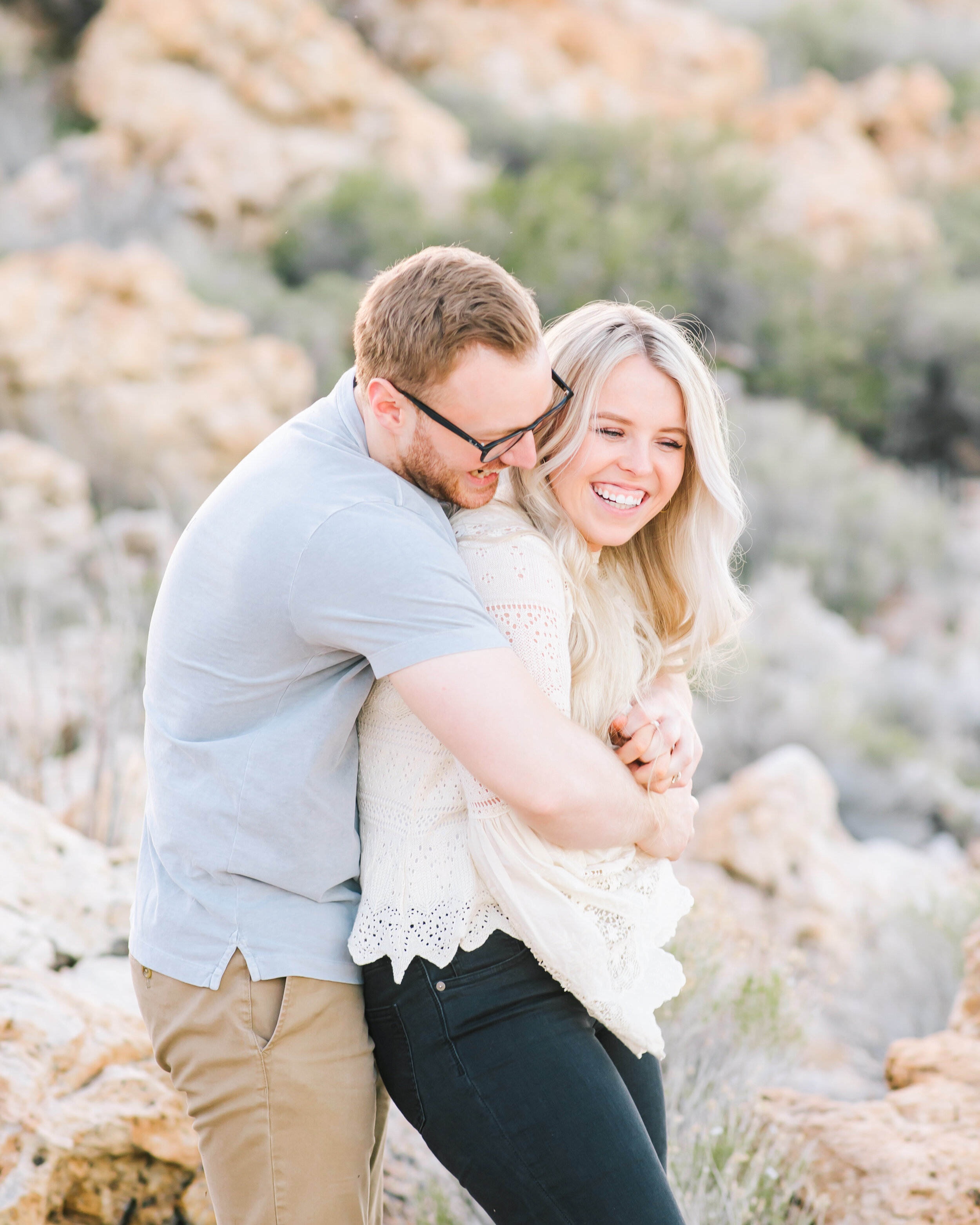  couple hug from behind pose inspiration happy couple capturing a happy moment young love couple outfit inspiration couple look inspiration mens outfit inspiration semi formal womens outfit inspiration semi formal summer engagement session goals utah