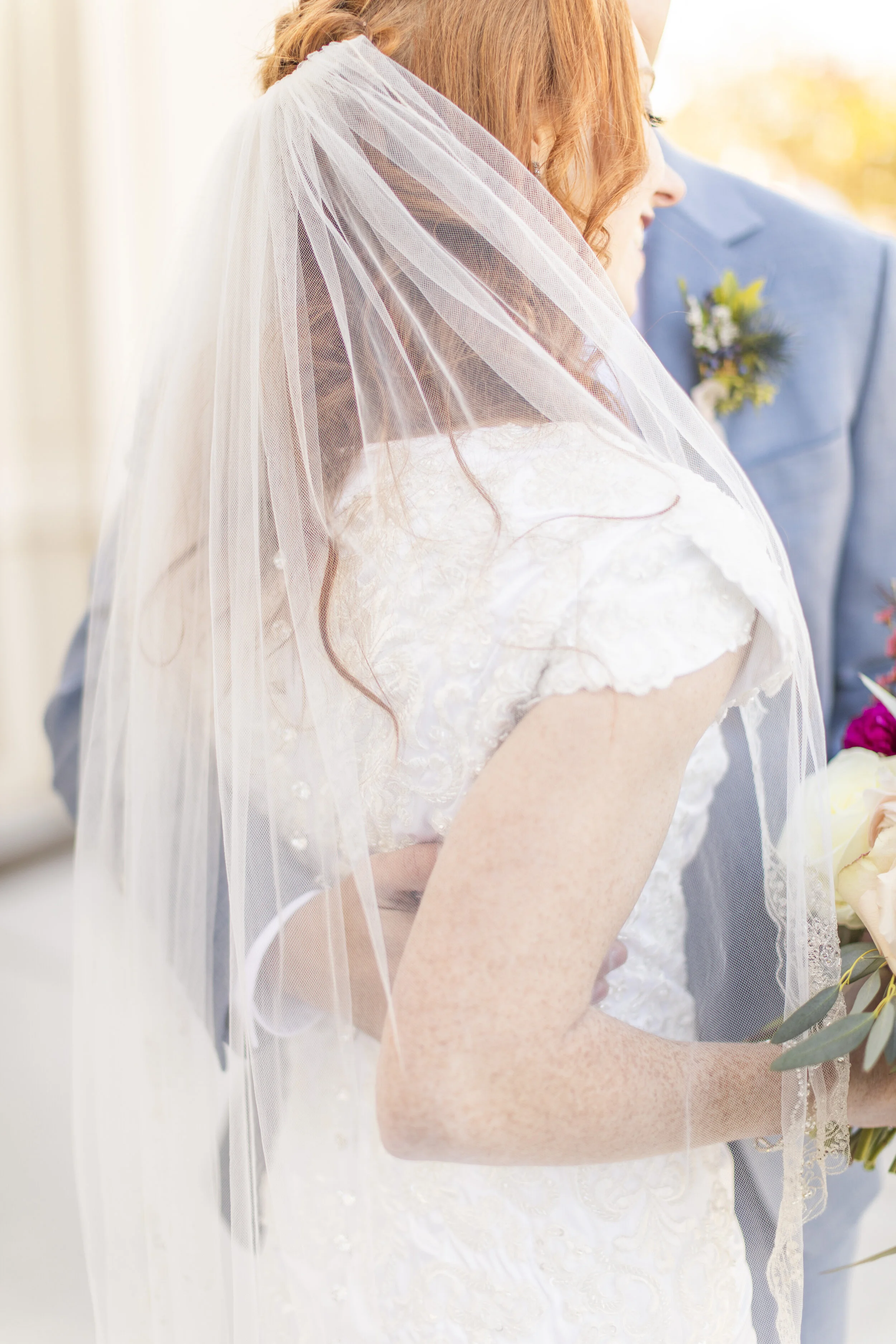  wedding pose inspiration unique angle husband holding wife beautiful veil romantic moment between husband and wife short sleeved wedding dress summer wedding dress wedding dress inspiration wedding dress goals modest wedding dress mormon wedding lds