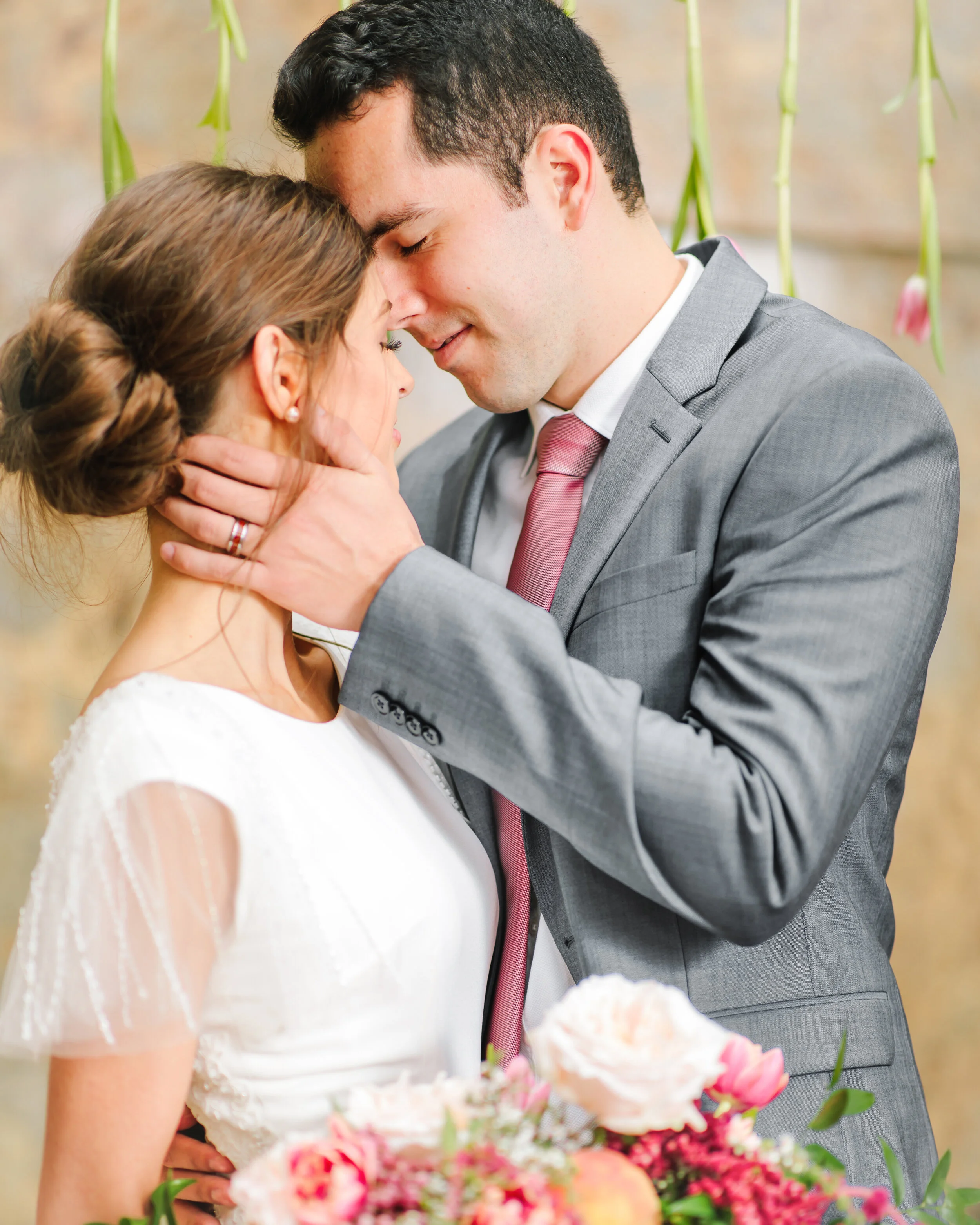  wedding dress inspiration beautiful flowing sleeves bridal wedding hairstyle inspiration simple elegant sweet sweet moment between husband and wife soft pinks wedding bouquet inspiration groom suit inspiration wedding tie inspiration solid pink tie 