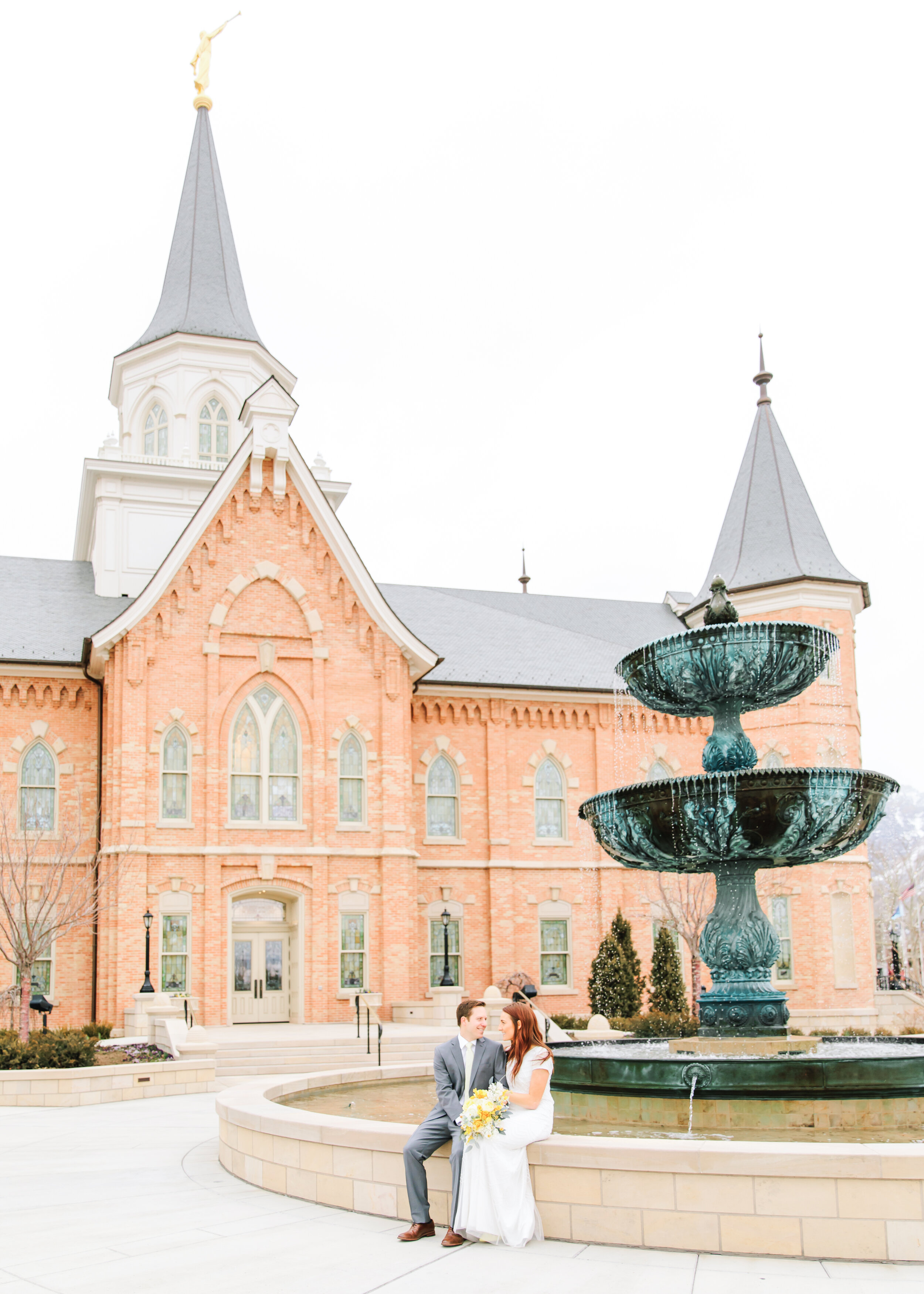  provo city center temple photo shoot by the water fountain inspiration sealed for time and all eternity husband and wife sweet moment together captured forever man and wife wedding formals professional wedding photographer utah clarity lane photogra