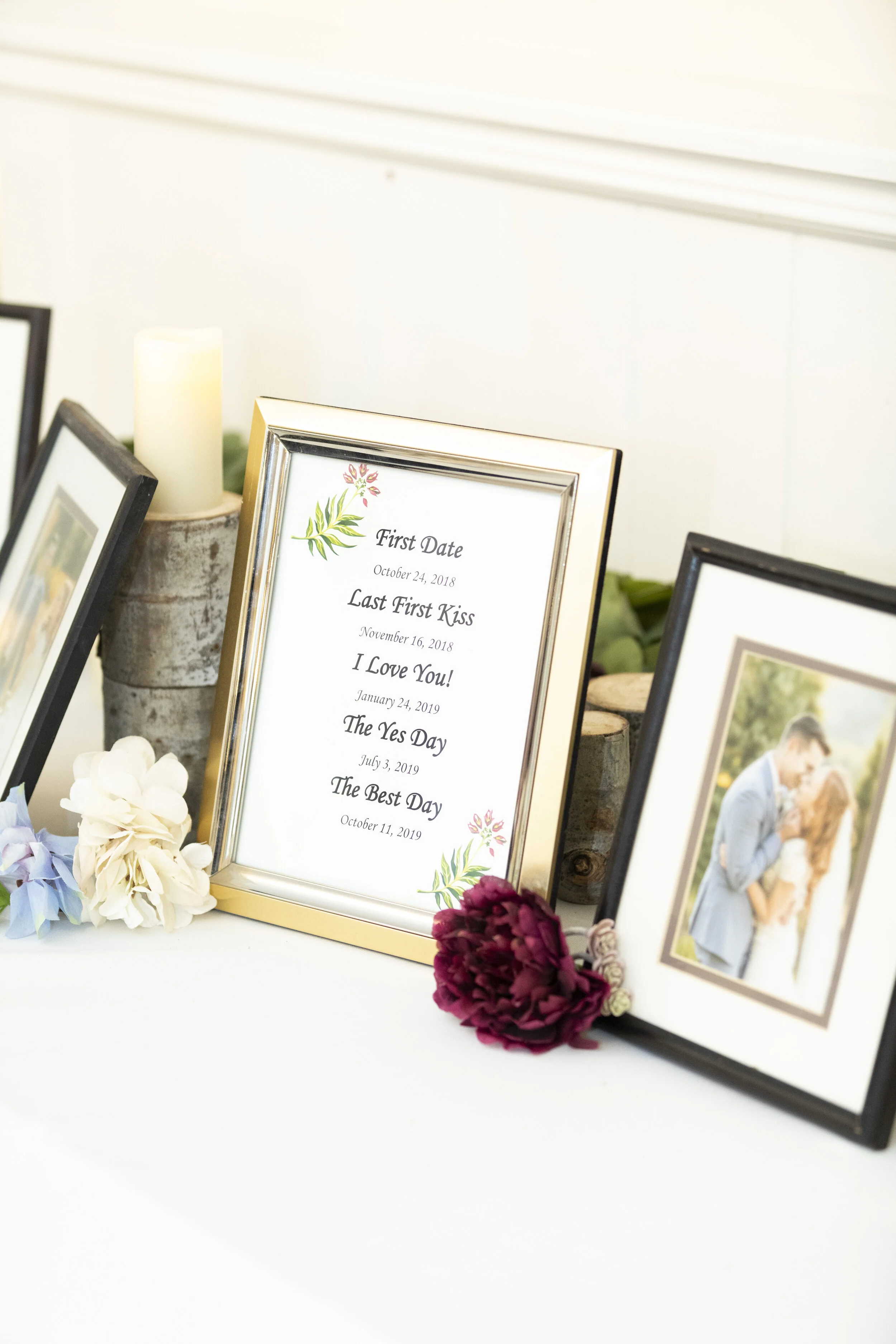  wedding decoration inspiration get to know the bride and groom table set up inspiration lots of picture frames and pictures of the couple simple understated wedding decoration inspiration and ideas wedding reception decoration ideas  utah wedding re