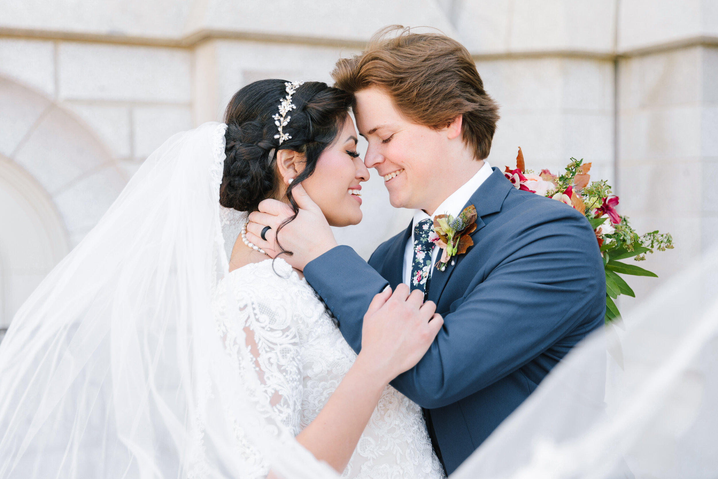  husband and wife touching foreheads sweet moment between the newly weds flowing veil beautiful couple bride and groom attire inspiration wedding photo shoot goals wedding photo shoot pose inspiration for the married couple couple goals sealed for ti