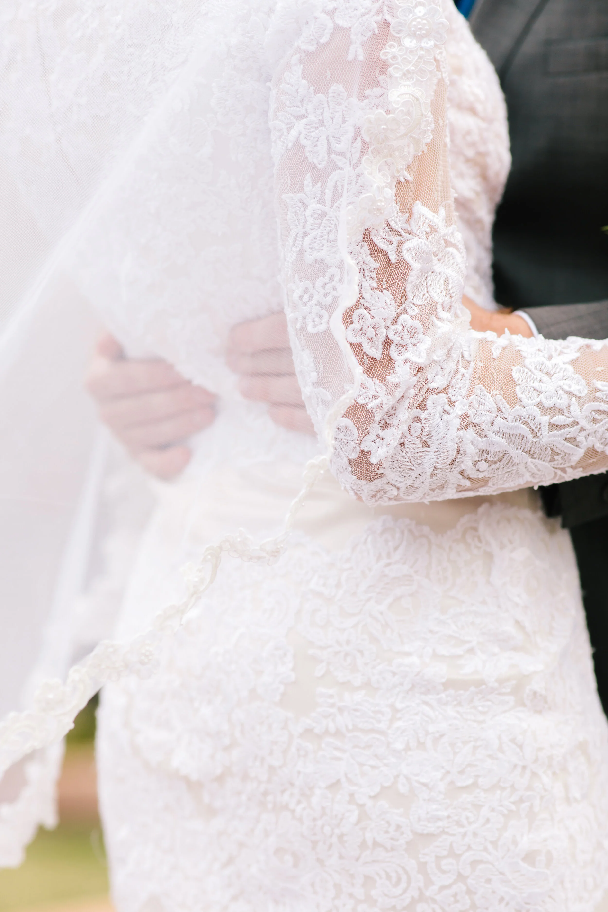  gorgeous lace wedding dress beautiful winter long sleeved wedding dress inspiration modest wedding dress inspiration lace long sleeved mermaid dress inspiration couple pose inspiration husband holding wife wedding veil inspiration utah wedding  #wed