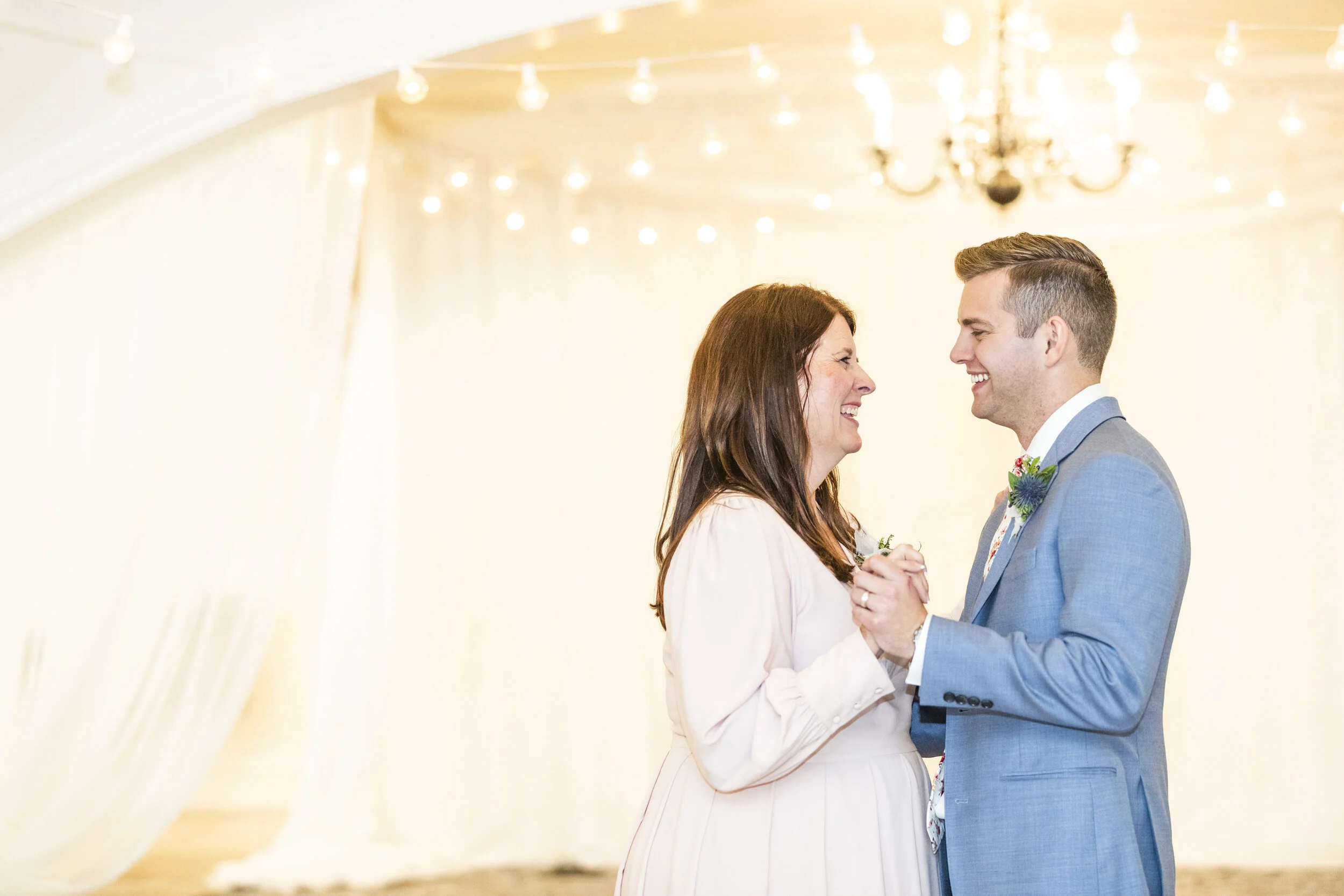  mother and son dance pose inspiration wedding tradition fun mother of the groom attire inspiration modest mother of the bride attire inspiration groom wedding suit attire style and look inspiration blue suit wedding reception area decoration ideas c