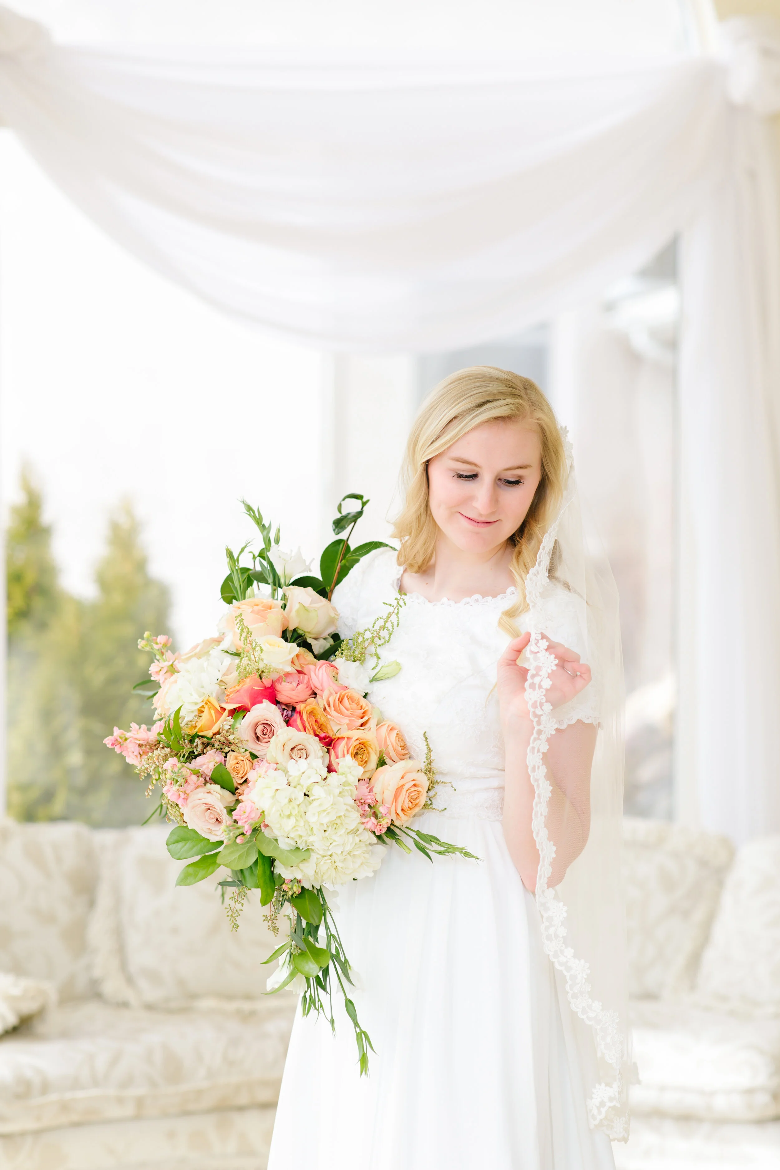  beautiful orange and pink wedding bouquet unique wedding bouquet style and shape beautiful bridal pose inspiration just the bride photo shoot formal wedding photo shoot inspiration summer wedding inspiration summer wedding dress inspiration goals #w