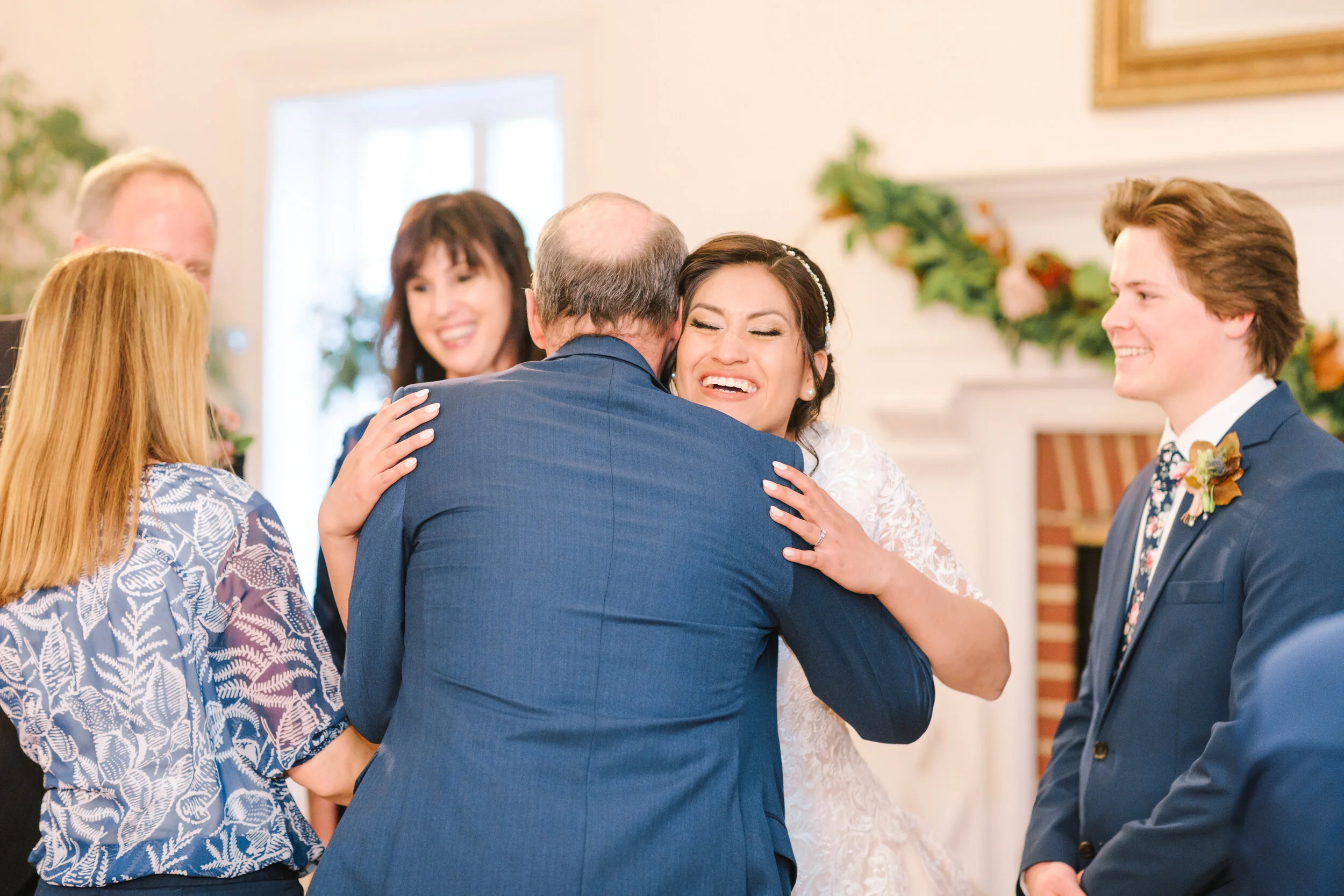  wedding reception guest line getting to know the happy couple hugging loved ones wedding line inspiration wedding line photo shoot moment radiant bride happy room greeting the wedding party guests wedding inspiration lds reception inspiration weddin