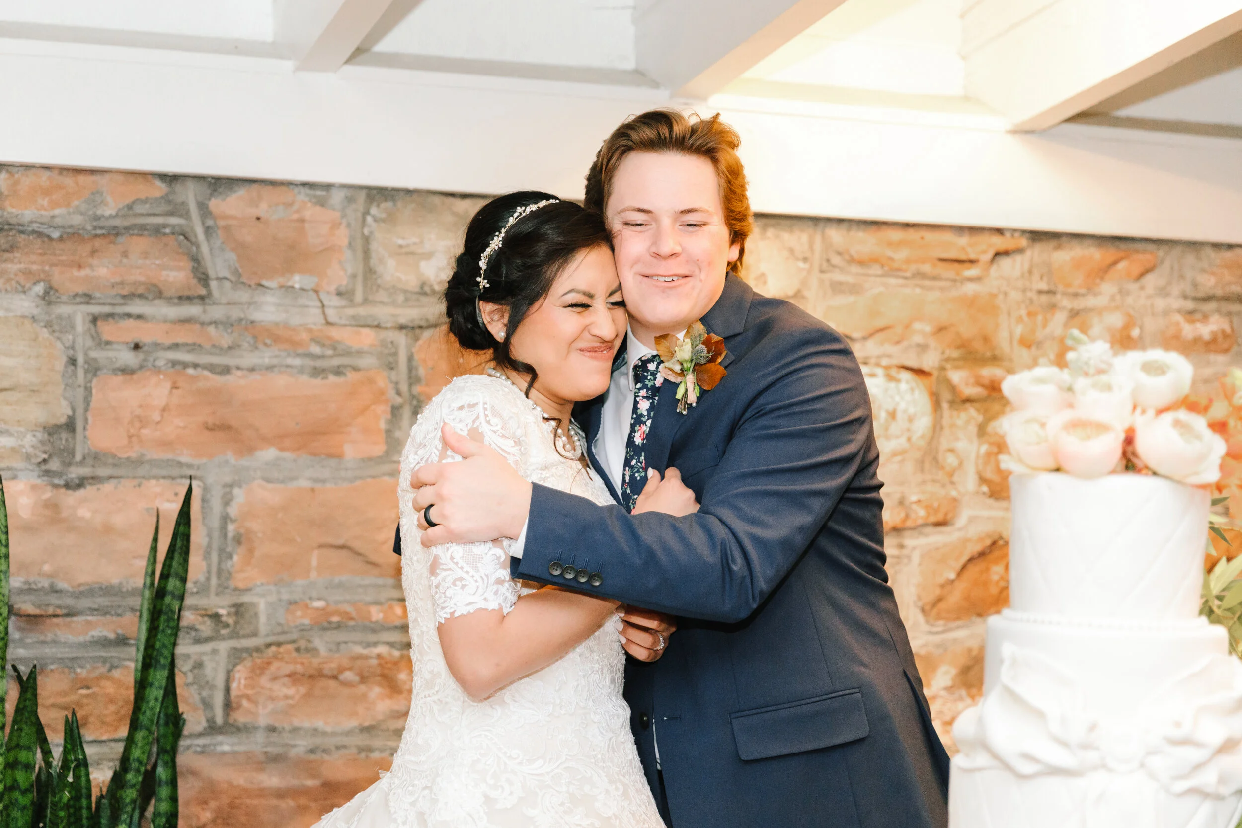   fun inspiration for your wedding reception wedding cake goals hug after cutting the cake loving couple beautiful wedding reception location all white wedding cake inspiration how to make it unique and beautiful wedding cake roses are to die for bea