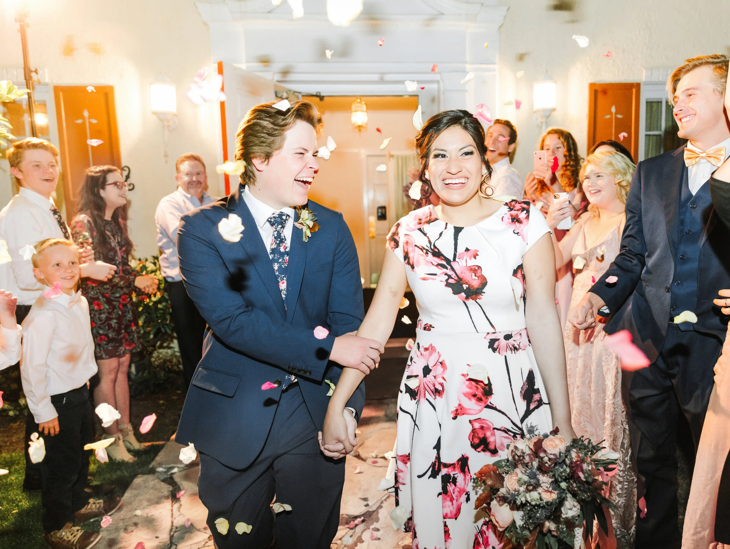  wedding reception send off inspiration wedding reception send of bridal outfit inspiration throwing rose petals in the air is a romantic touch ecstatic husband and wife being sent off onto their honey moon end of the wedding reception wedding recept