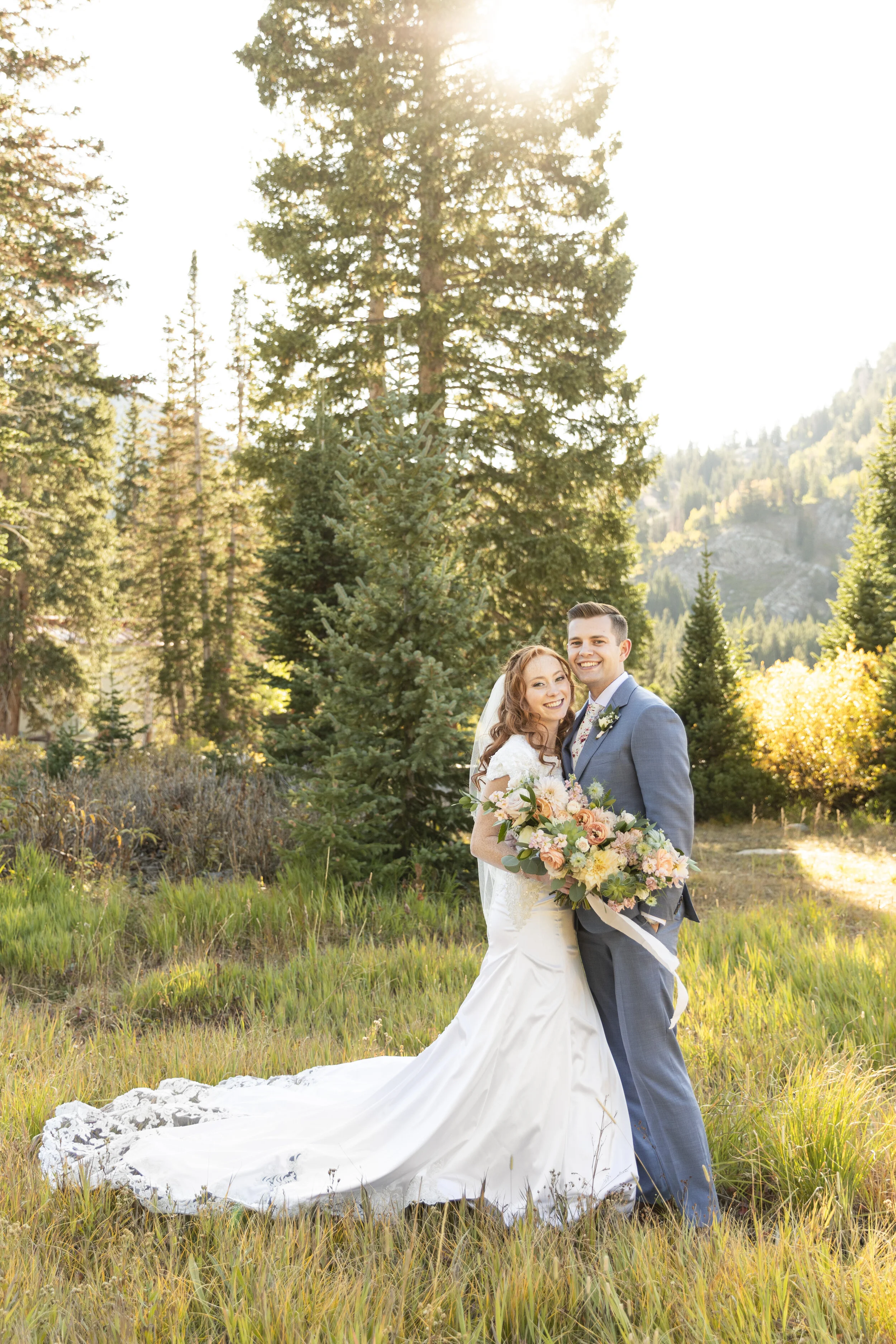  Print worthy wedding portraits golden hour wedding photos forest green trees bridals large bouquet beautiful train wedding gown lace husband and wife just married canyon bridals sunset wedding photos professional wedding photographer salt lake city 