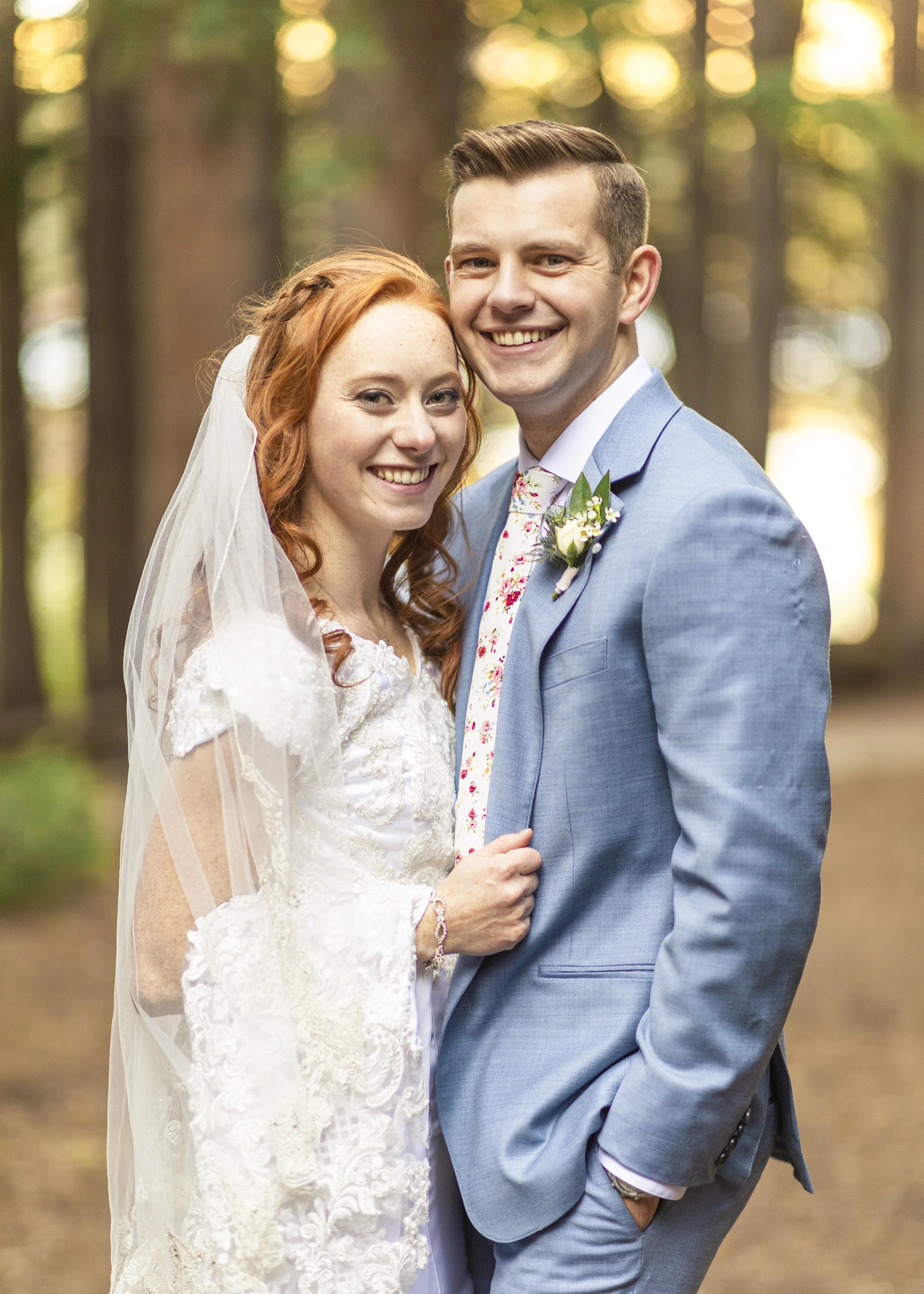  Perfect wedding announcement photo wedding portrait bride and groom smiling what to do with wedding dress train lace train long train light blue suit groom couple in focus wedding photo professional wedding photography silver lake utah salt lake cit