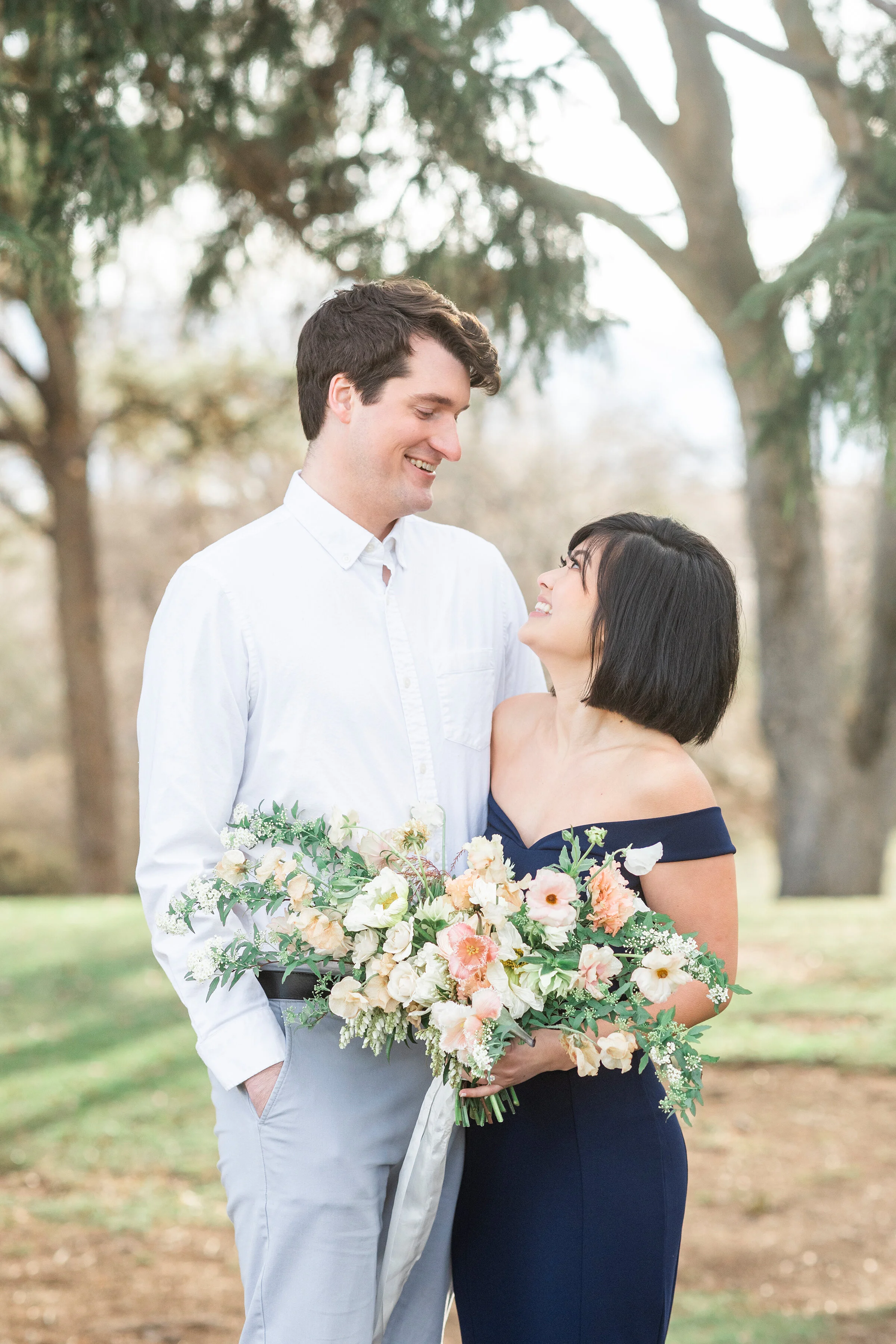 Beautiful newlyweds standing in the mist in a romantic formal photo shoot by Clarity Lane. Formal photo shoot attire inspiration ideas and goals wedding bouquet inspiration unique bouquet inspiration  formal photo shoot goals ideas and inspiration c