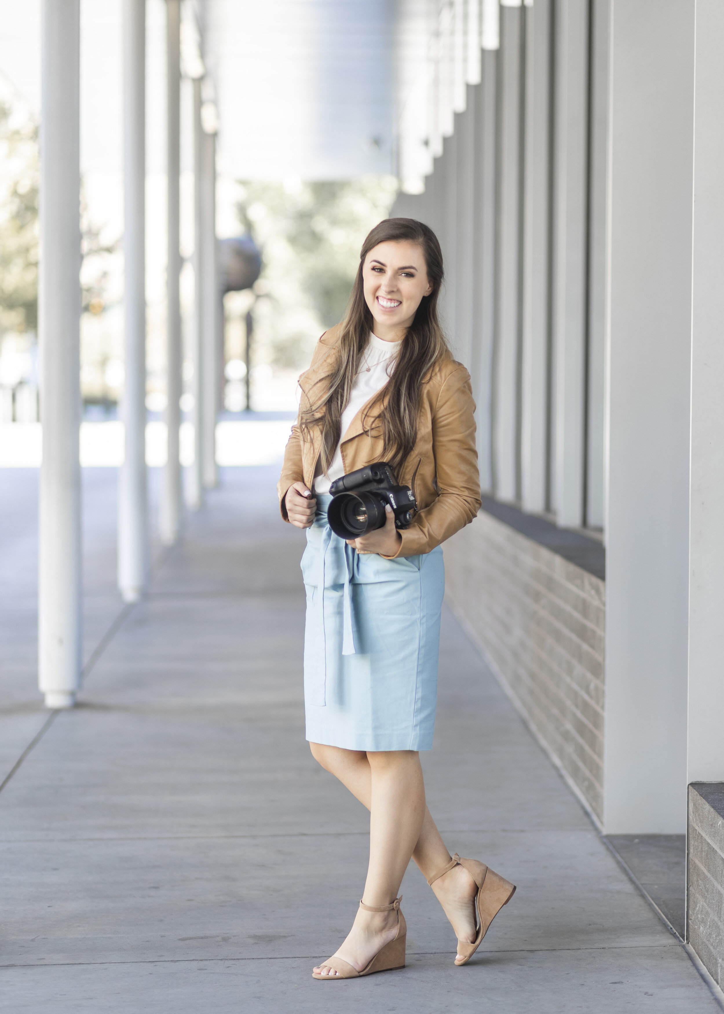  Posed in front of Provo, Utah’s Brigham Young University’s library, Savanna from Clarity Lane Photography flaunts her DSLR camera. utah valley professional photographer, brigham young university library, canon dslr camera, nude wedges, camel colored