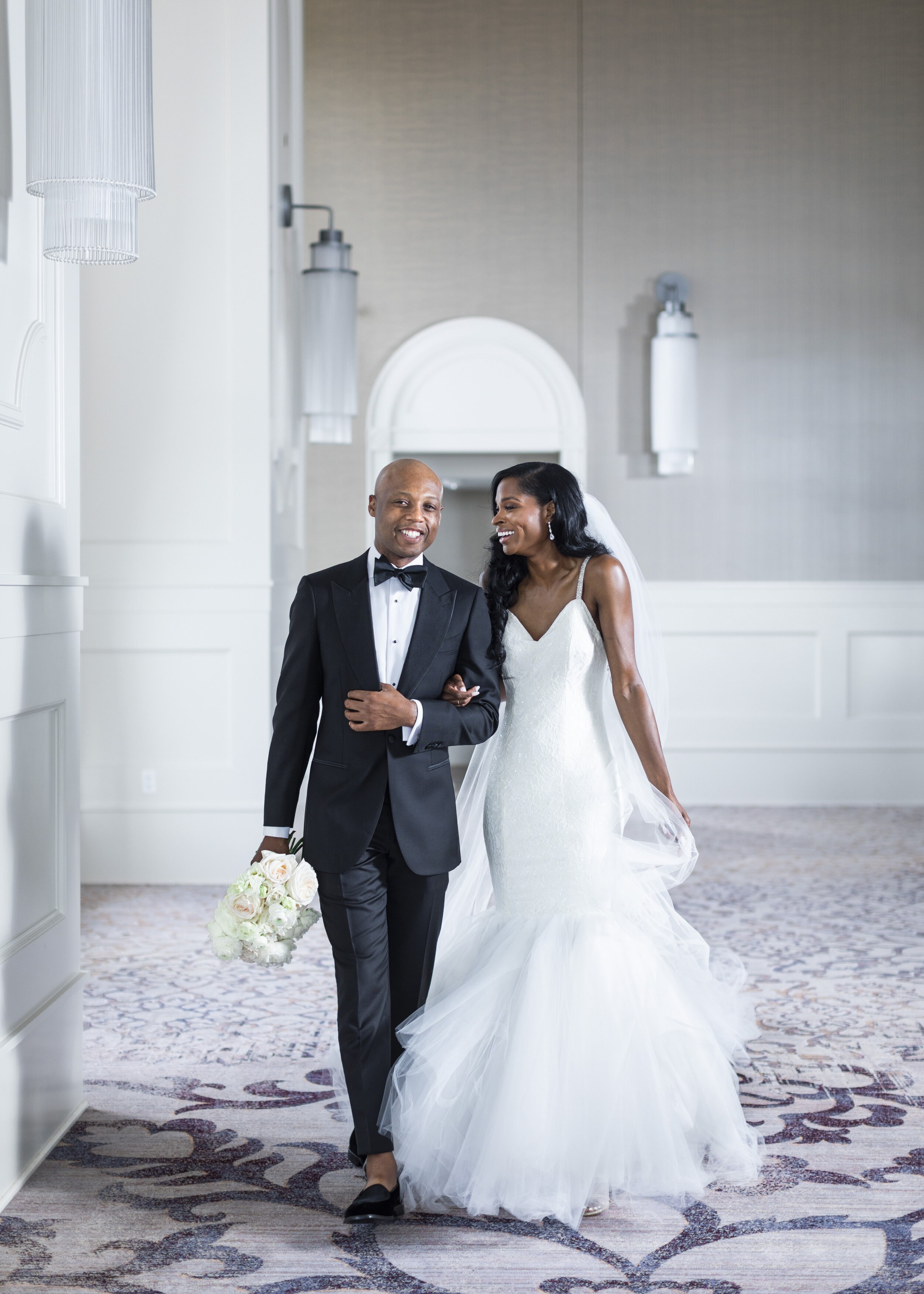  An adoring bride looks at her handsome husband at the gorgeous Hotel Vin near Dallas, TX. poses for couples wedding venues in dallas texas bride and groom outfit inspiration mermaid dress texas summer wedding ideas indoor venue ideas savanna richard