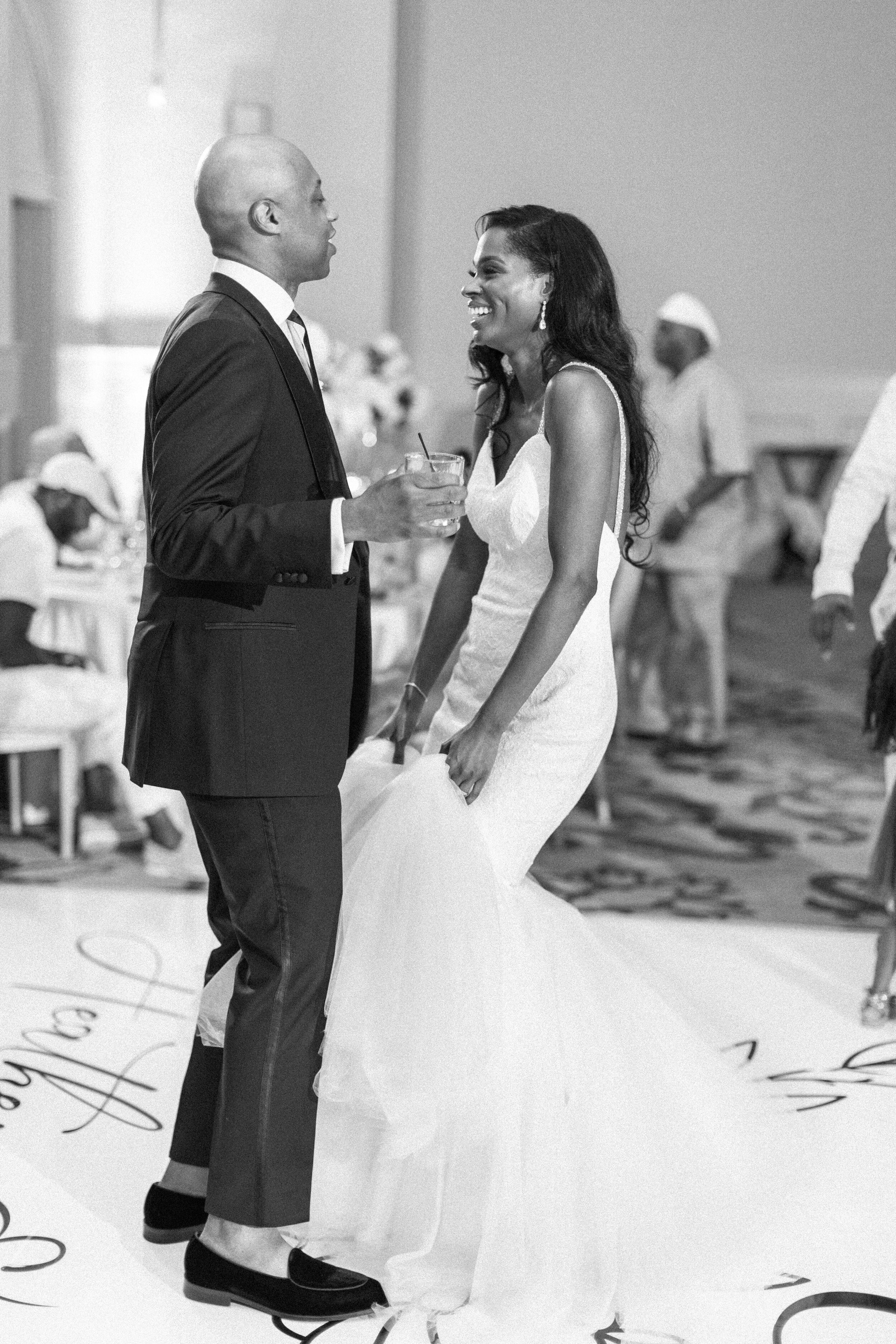  A lovely bride and groom enjoy a dance together at their wedding. Pictures on the dance floor wedding photography unique wedding photo ideas mermaid wedding dress bride and groom picture ideas DFW wedding photographer elegant wedding high end dallas