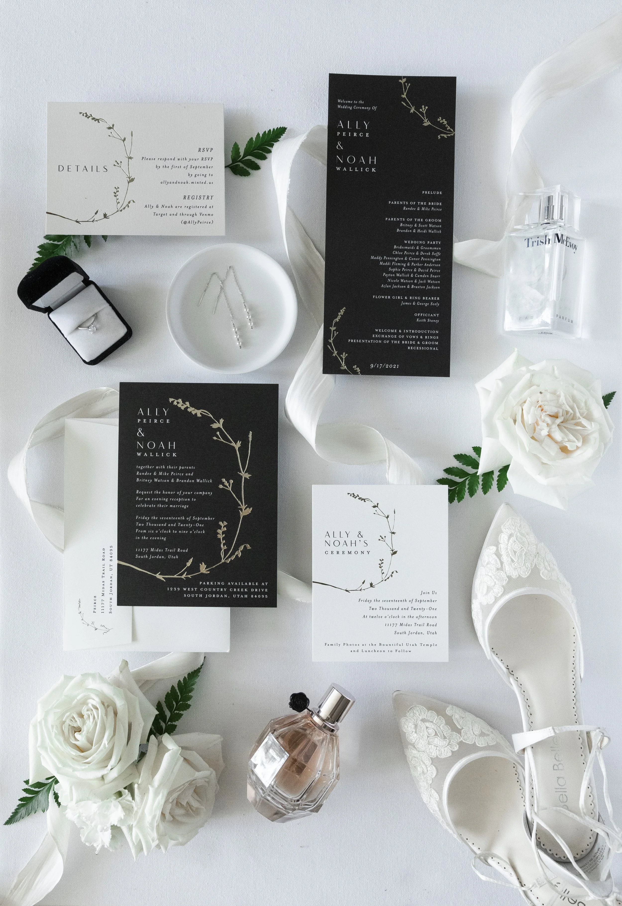  Flat lay wedding photo with rings, announcements, shoes, and perfume by Savanna Richardson Photography. Utah wedding photos wedding flat lays wedding rings #savannarichardsonphotography #utahphotographers #slcweddings #utahcountyweddingphotographer 