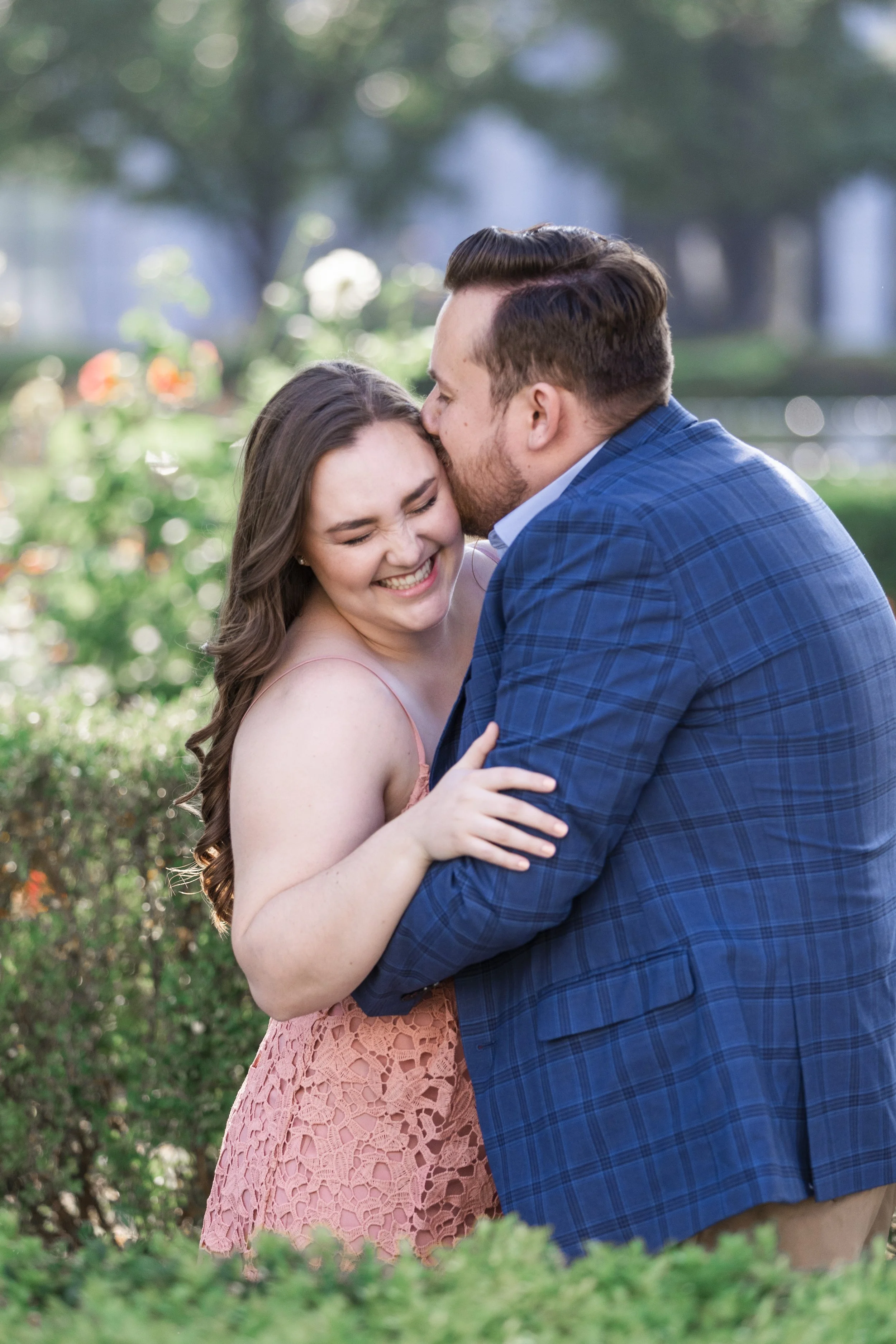  Savanna Richardson Photography captures a portrait of a couple kissing outside the Utah Capitol Building. engagement portrait photographers in Utah #savannarichardsonphotography #Utahcapitolphotography #utahengagements #utahengagementphotographer 