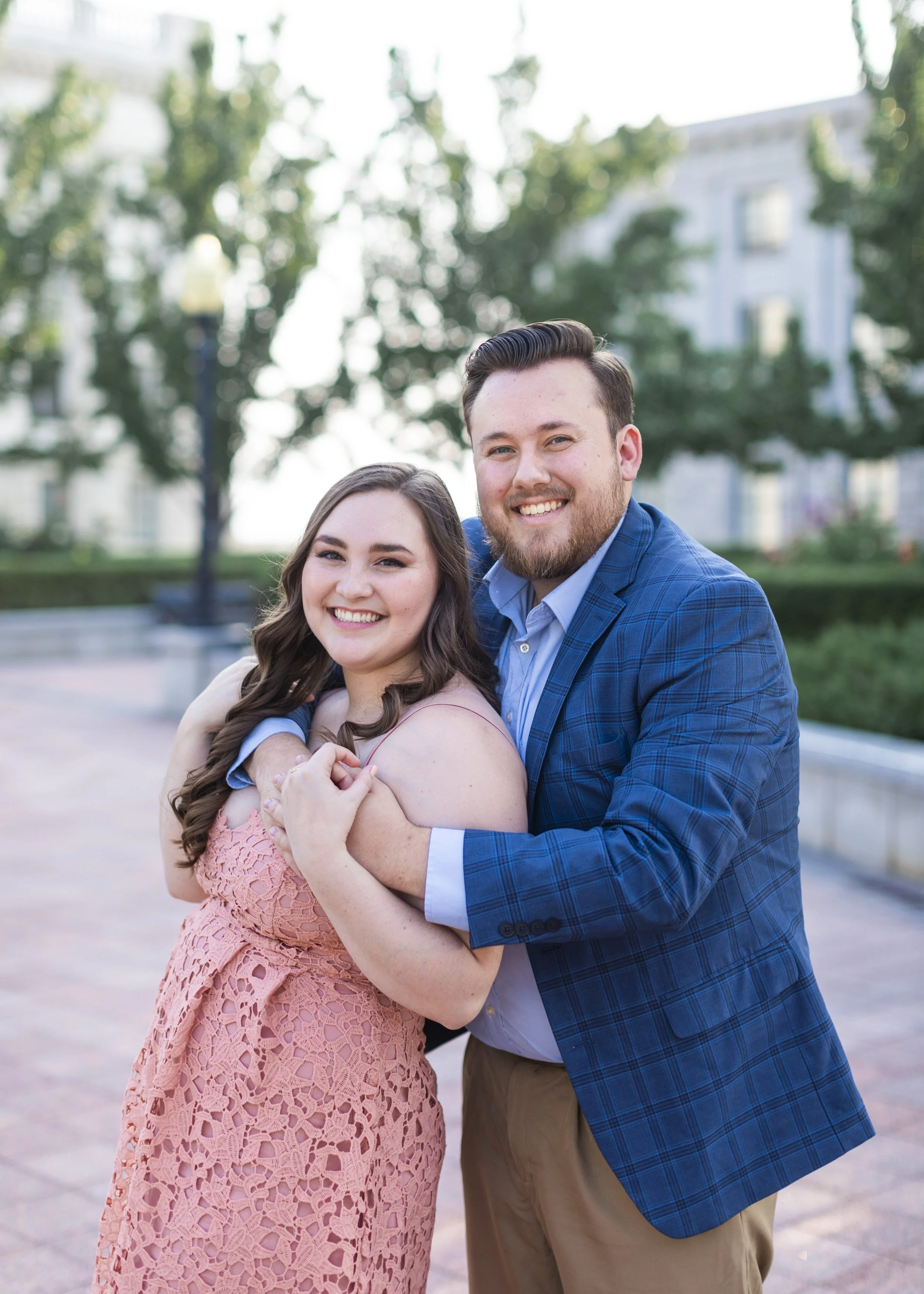  Utah engagement photographer takes a photo of a couple for their wedding announcement by Savanna Richardson Photography. SLC county photographers #savannarichardsonphotography #Utahcapitolphotography #utahengagements #utahengagementphotographer 