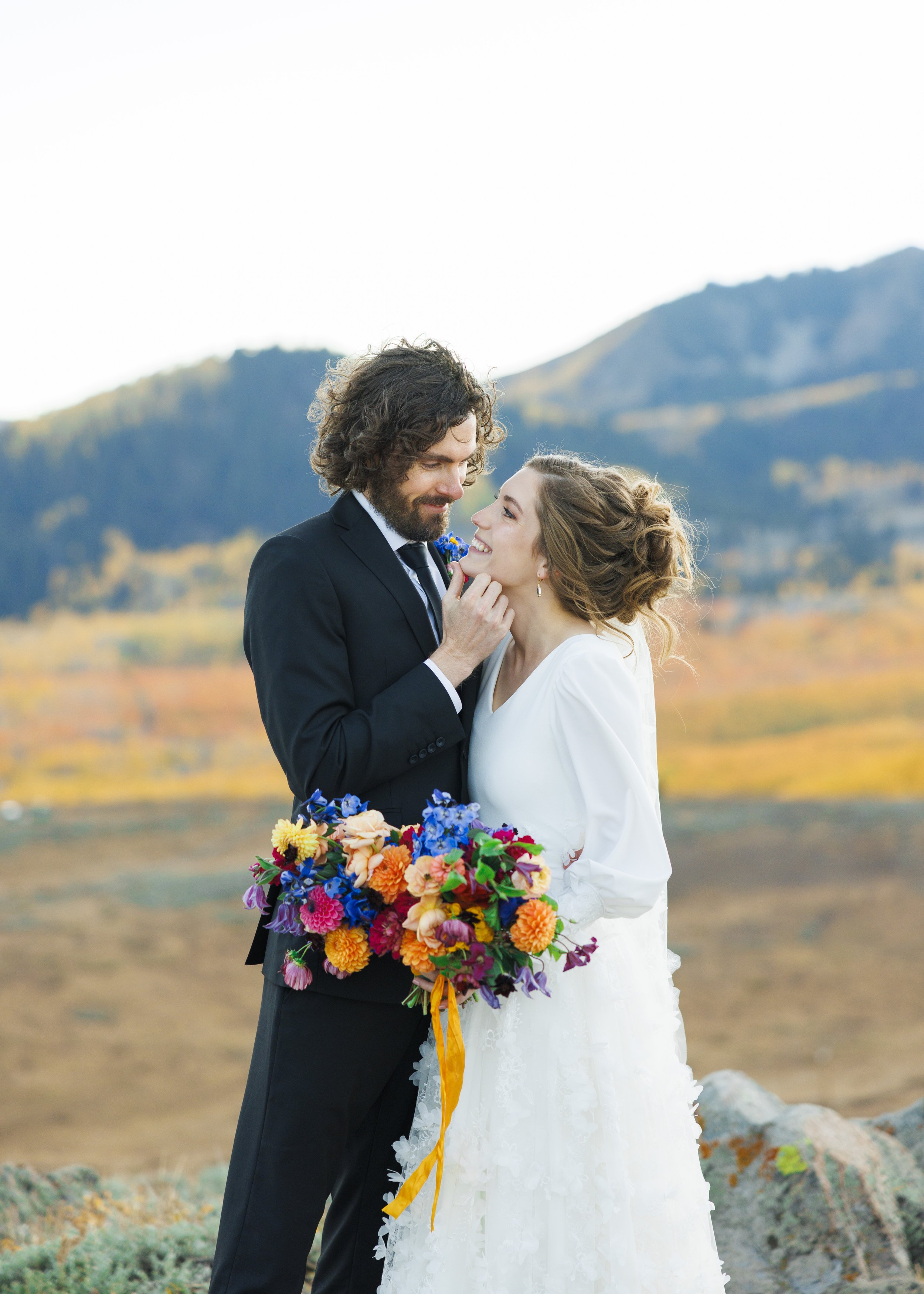  Savanna Richardson Photography captures the wedding formals of a bride and groom at Guardsman's Pass in Utah. tender wedding moments #SavannaRichardsonPhotography #SavannaRichardsonFormals #CottonwoodCanyon #WeddingFormals #SLCWedding #fallwed 