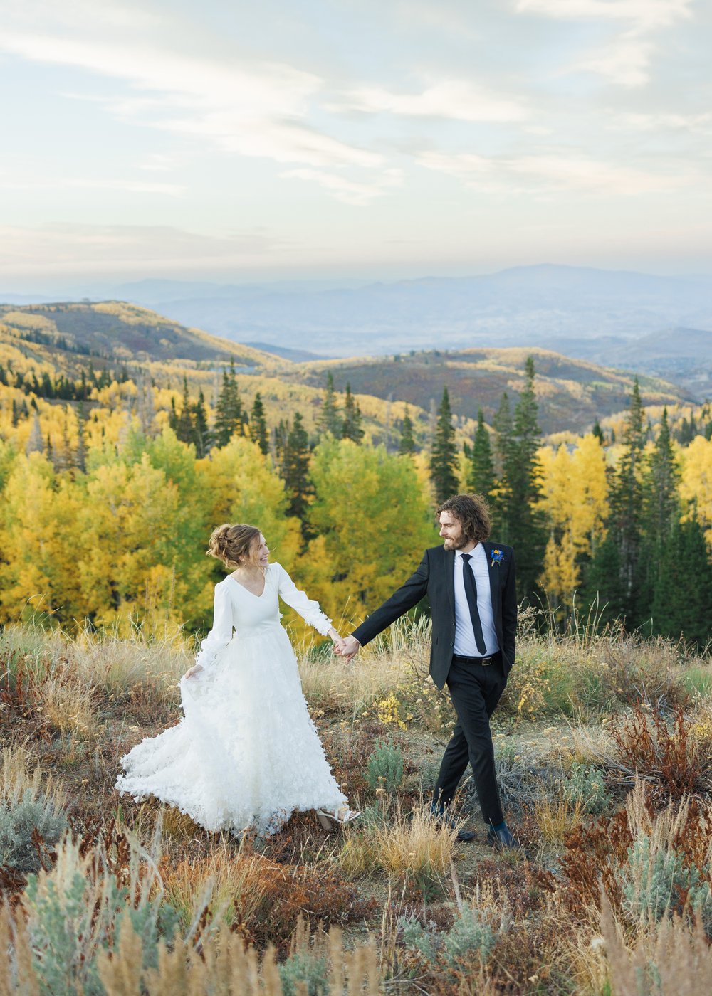  Savanna Richardson Photography captures a bride and groom with fall leaves at Silver Lake in the Cottonwood Canyon. fall bridals #SavannaRichardsonPhotography #SavannaRichardsonFormals #CottonwoodCanyon #WeddingFormals #SLCWedding #fallwed 
